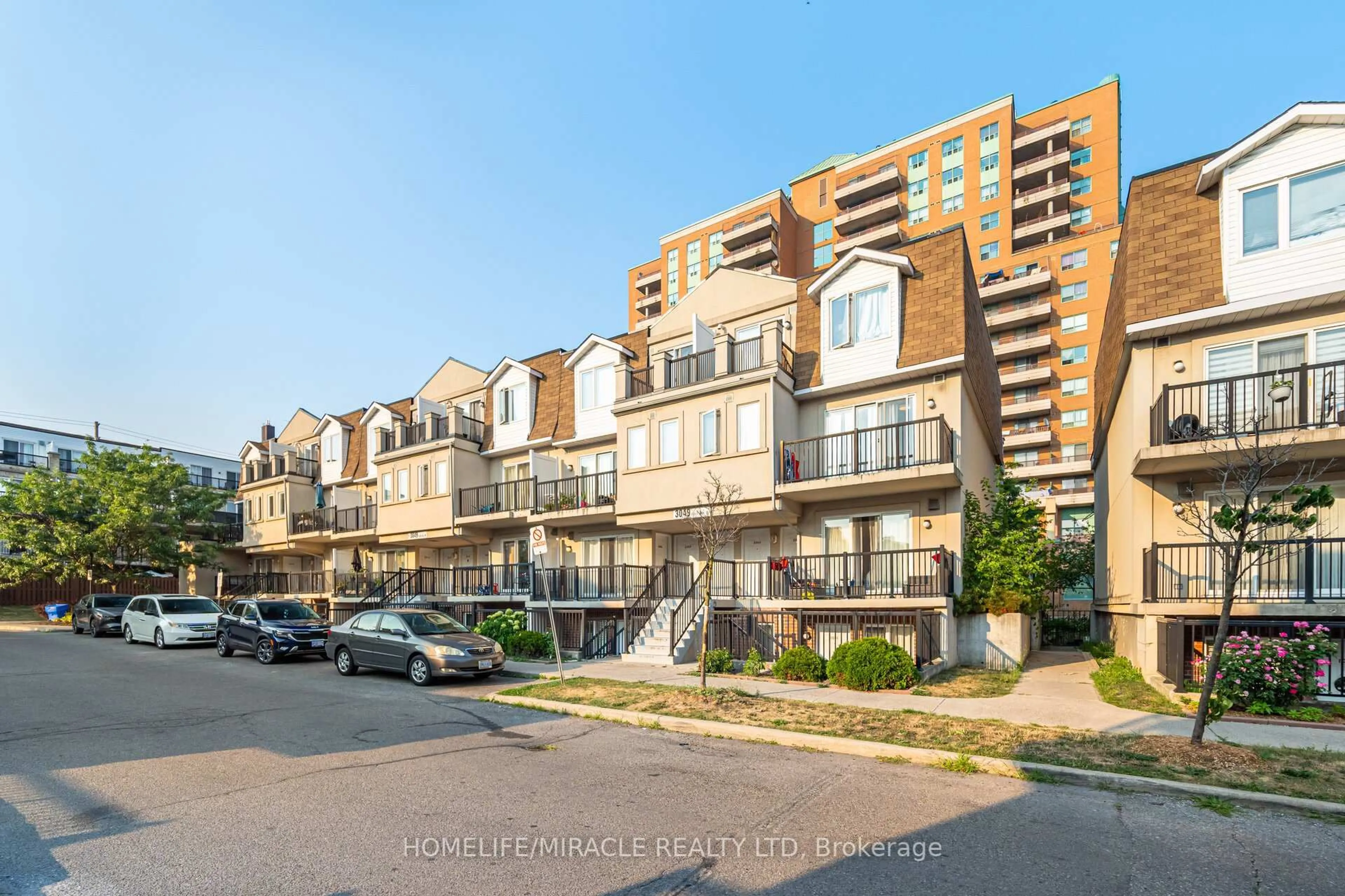 A pic from outside/outdoor area/front of a property/back of a property/a pic from drone, street for 3049 Finch Ave #2002, Toronto Ontario M9M 0A5