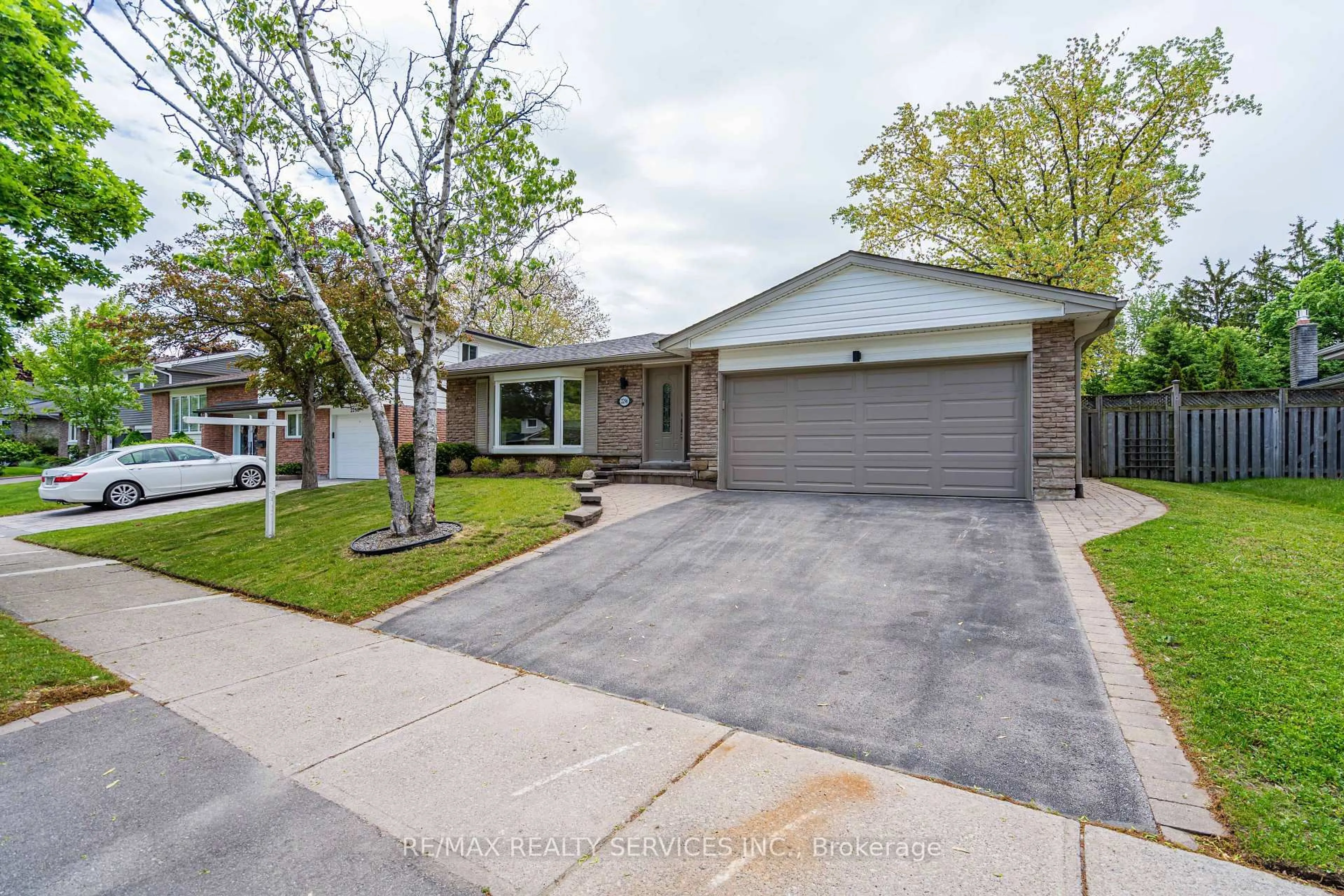 Home with brick exterior material, street for 2296 Devon Rd, Oakville Ontario L6J 5R4