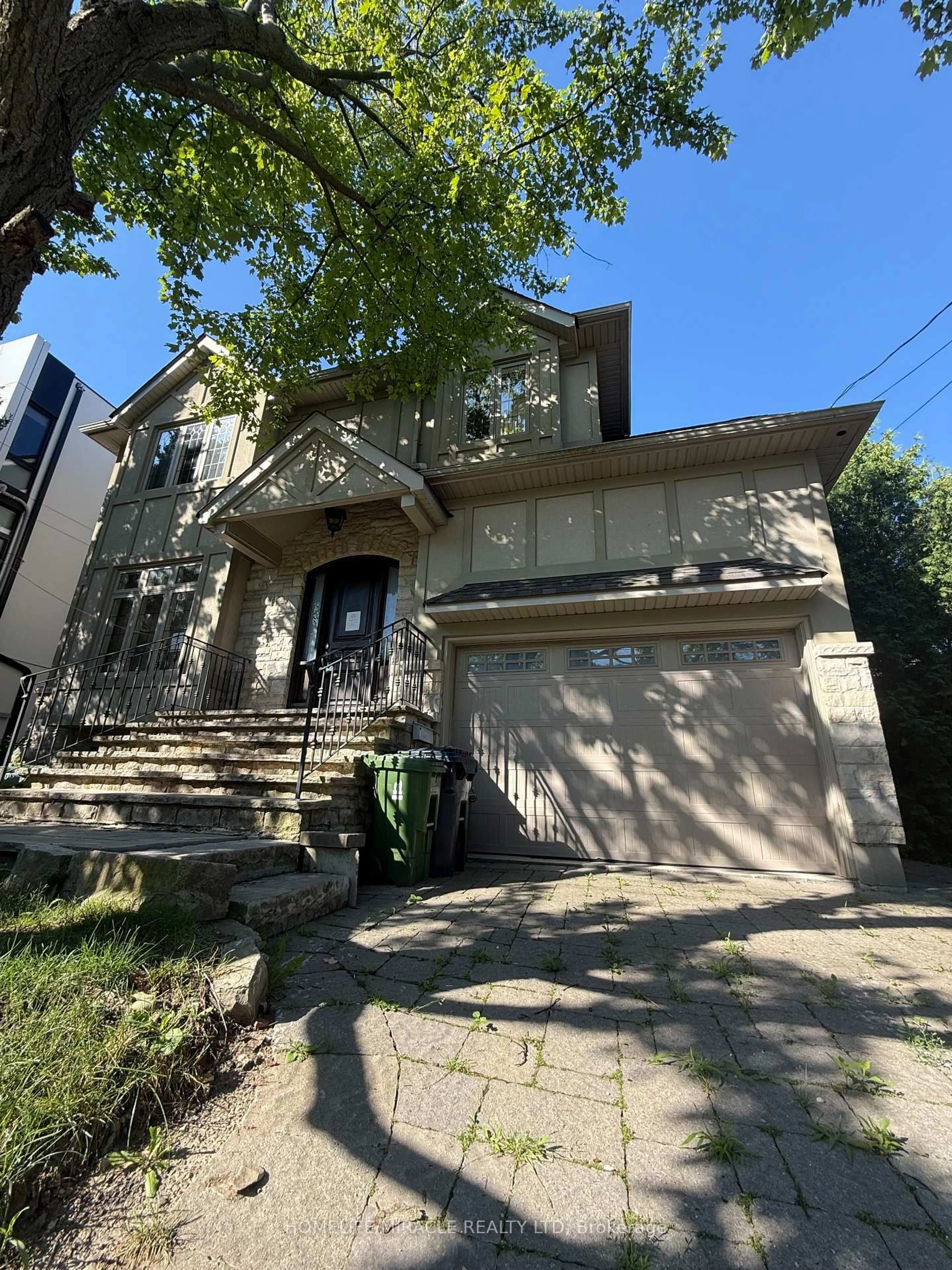 Home with brick exterior material, street for 16 Ravenscrest Dr, Toronto Ontario M9E 5M7