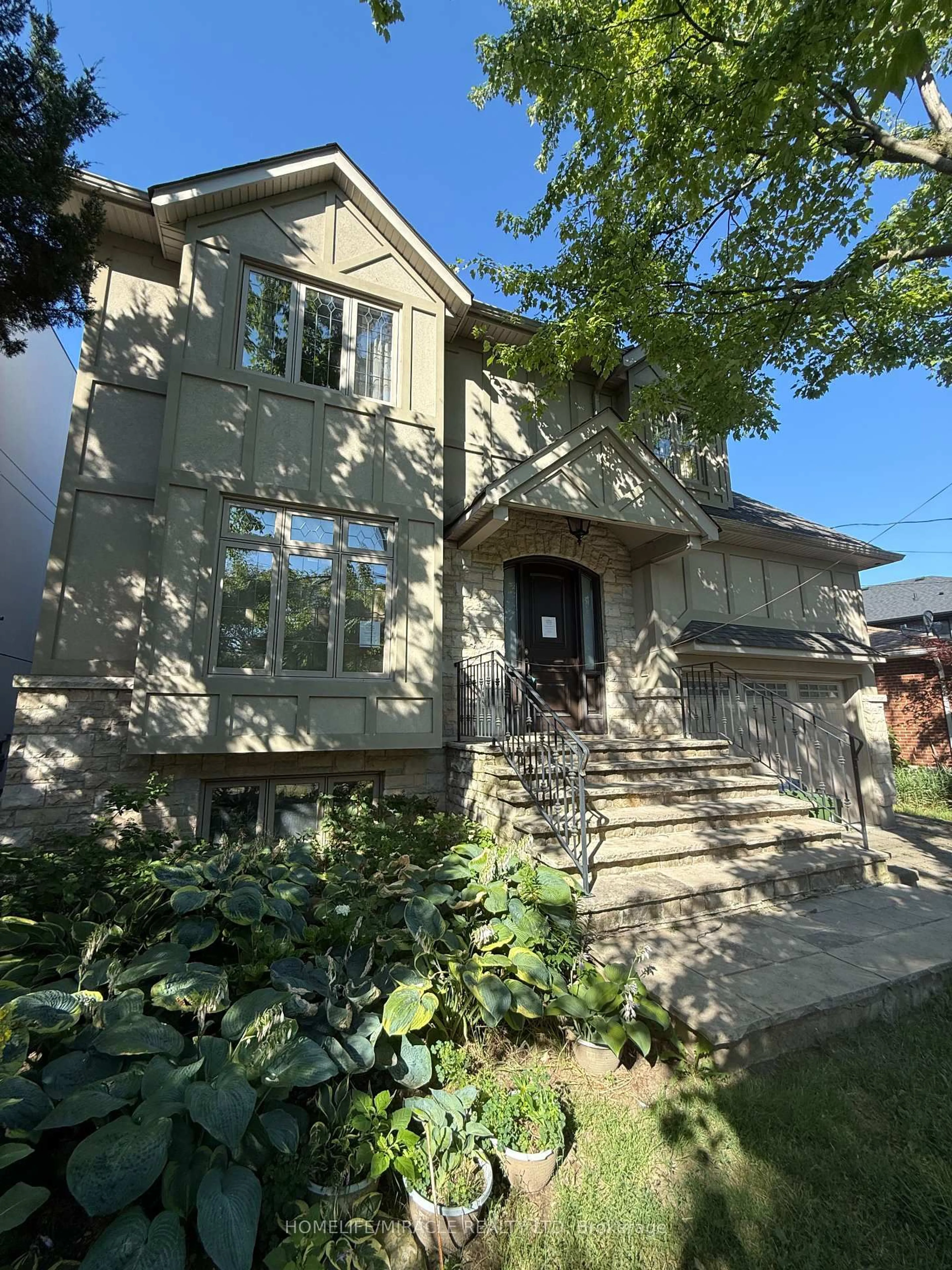 Home with brick exterior material, street for 16 Ravenscrest Dr, Toronto Ontario M9E 5M7
