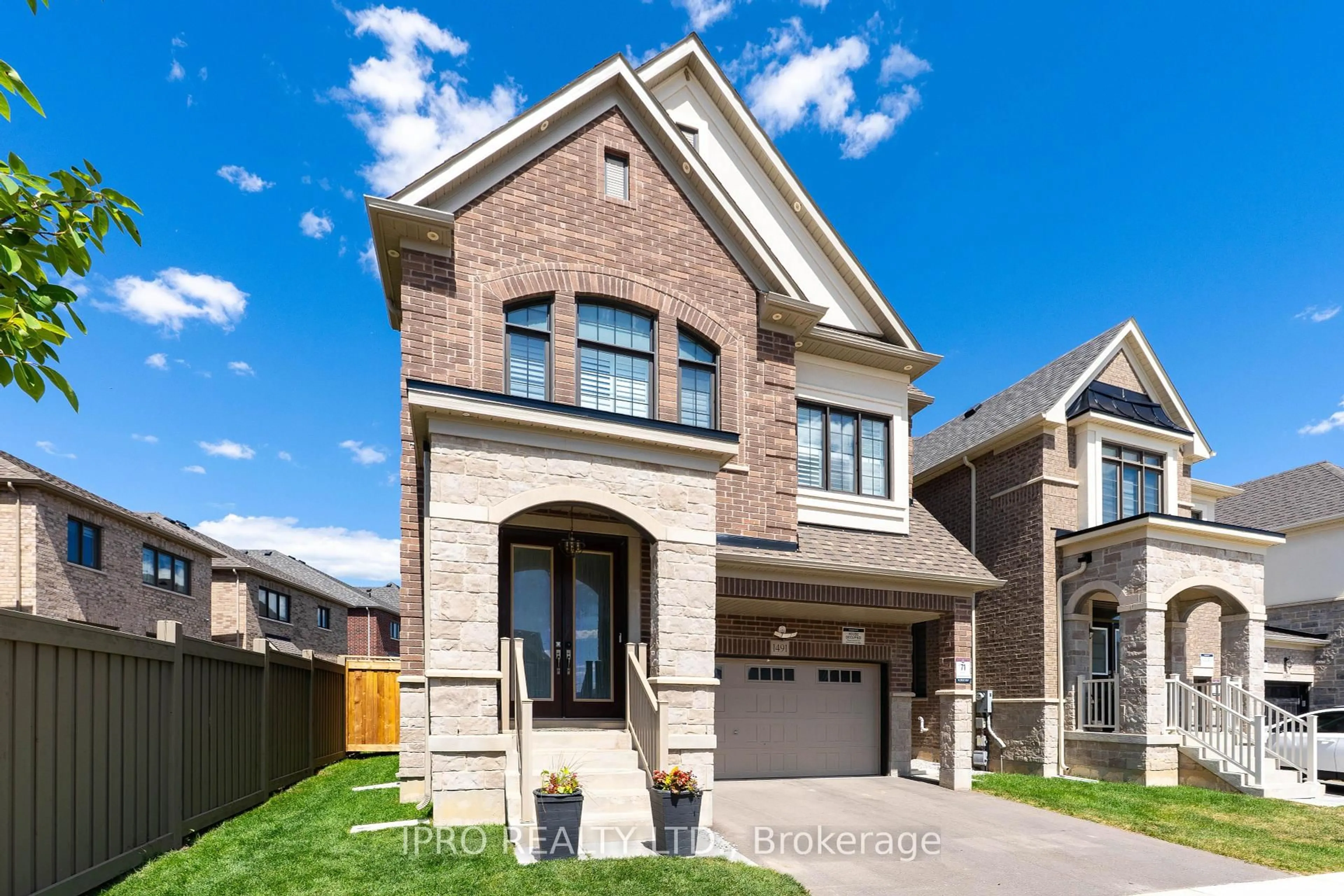 Home with brick exterior material, street for 1491 Kovachik Blvd, Milton Ontario L9E 1T5