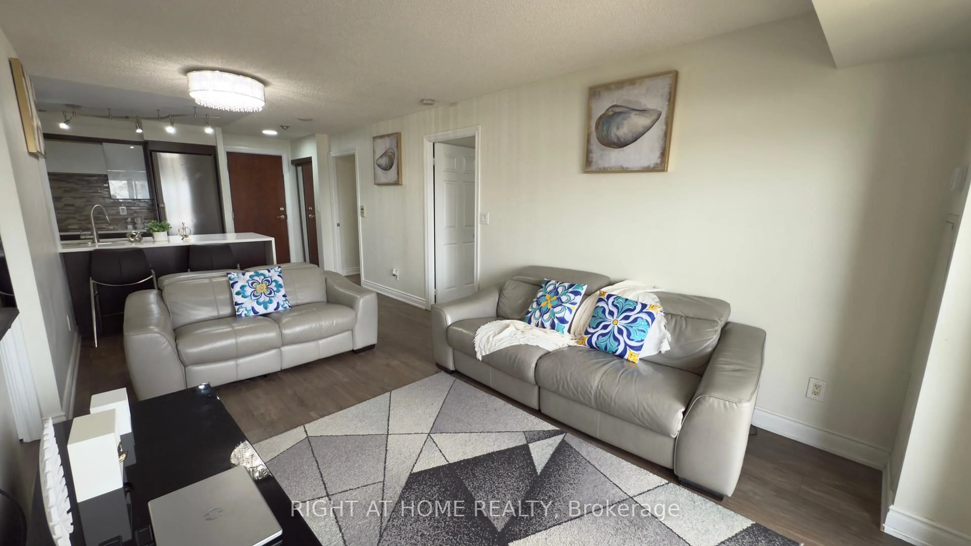 Living room with furniture, unknown for 310 BURNHAMTHORPE Rd #3303, Mississauga Ontario L5B 4P9