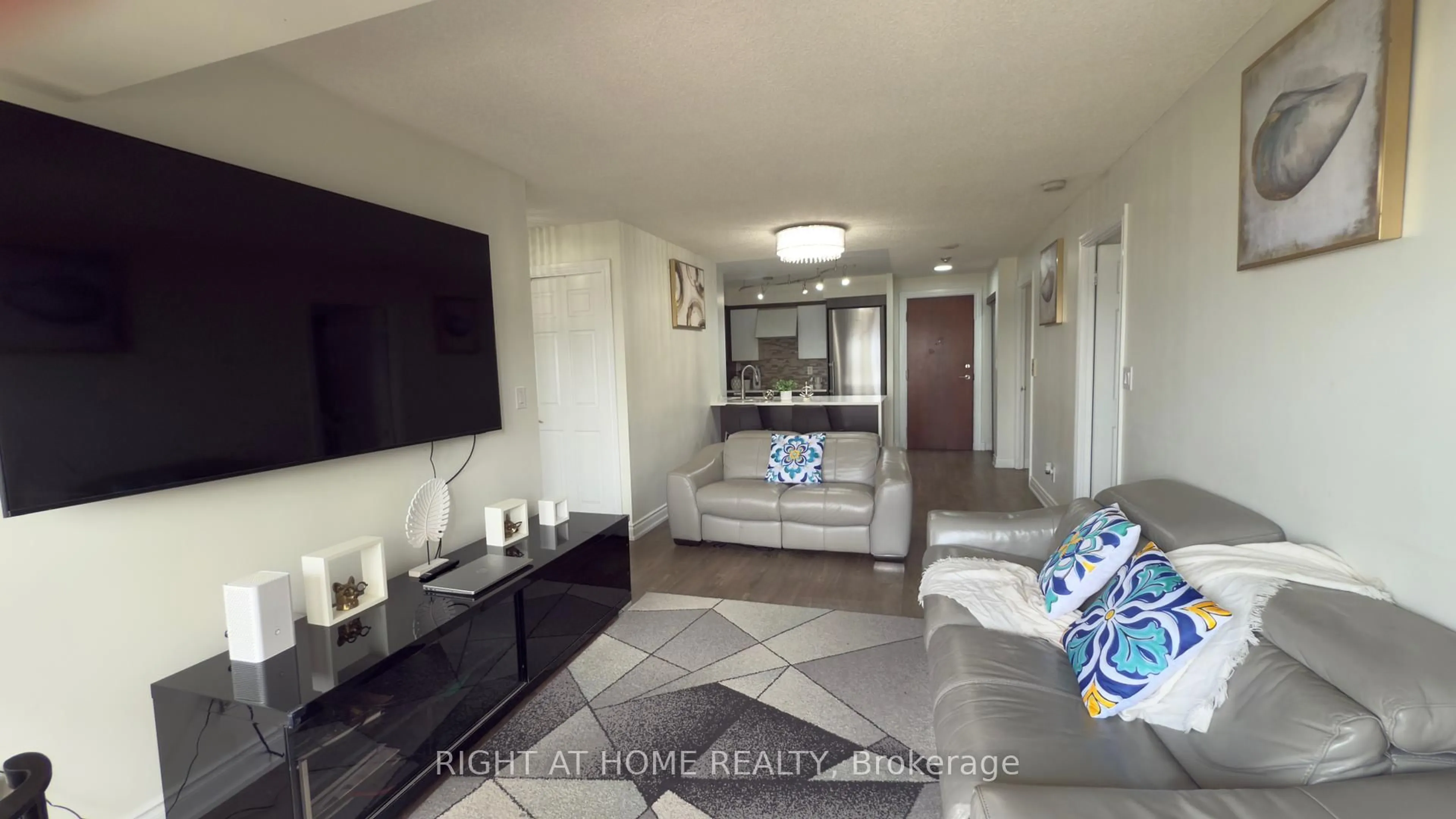 Living room with furniture, unknown for 310 BURNHAMTHORPE Rd #3303, Mississauga Ontario L5B 4P9