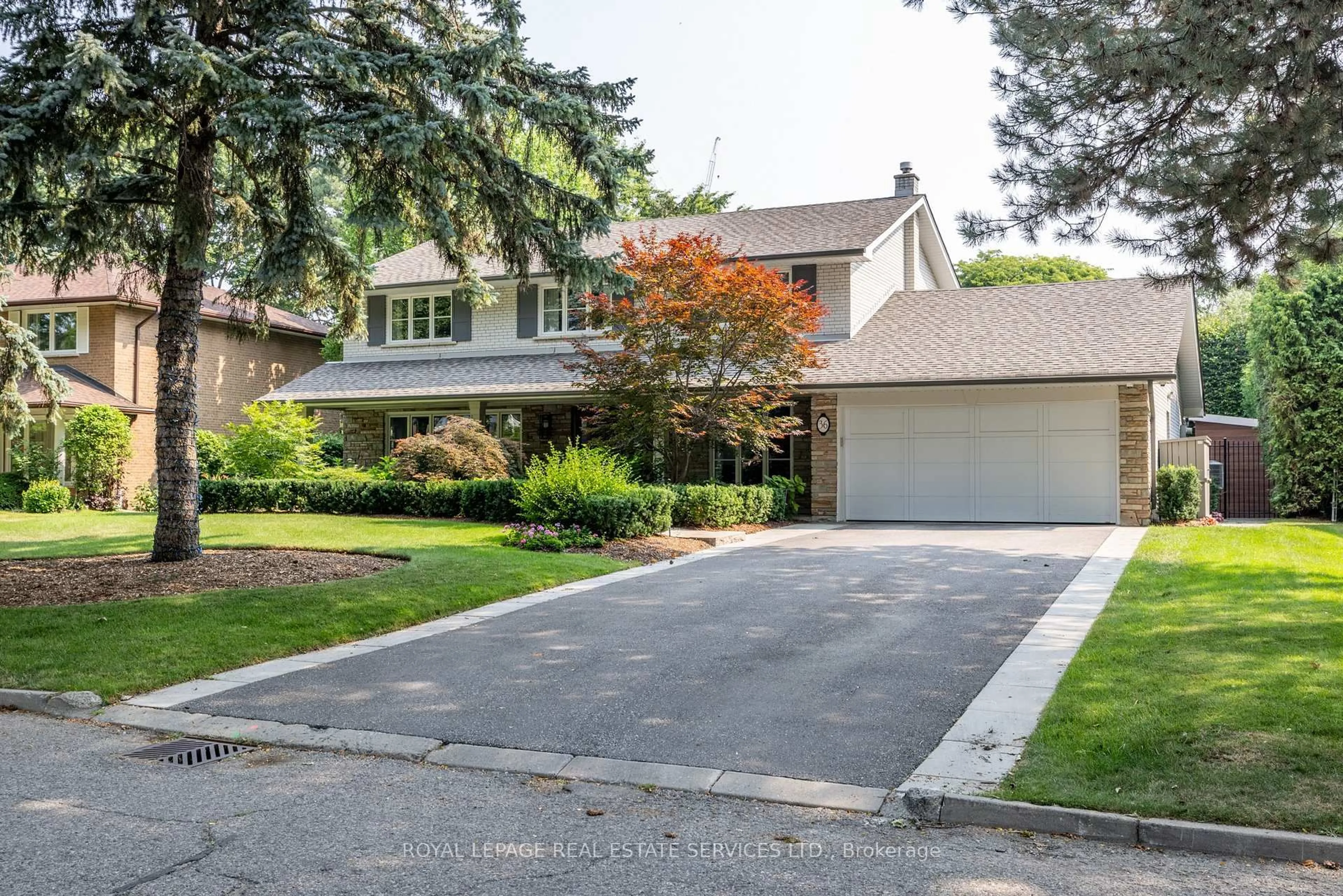 Home with brick exterior material, street for 36 Edenvale Cres, Toronto Ontario M9A 4A5