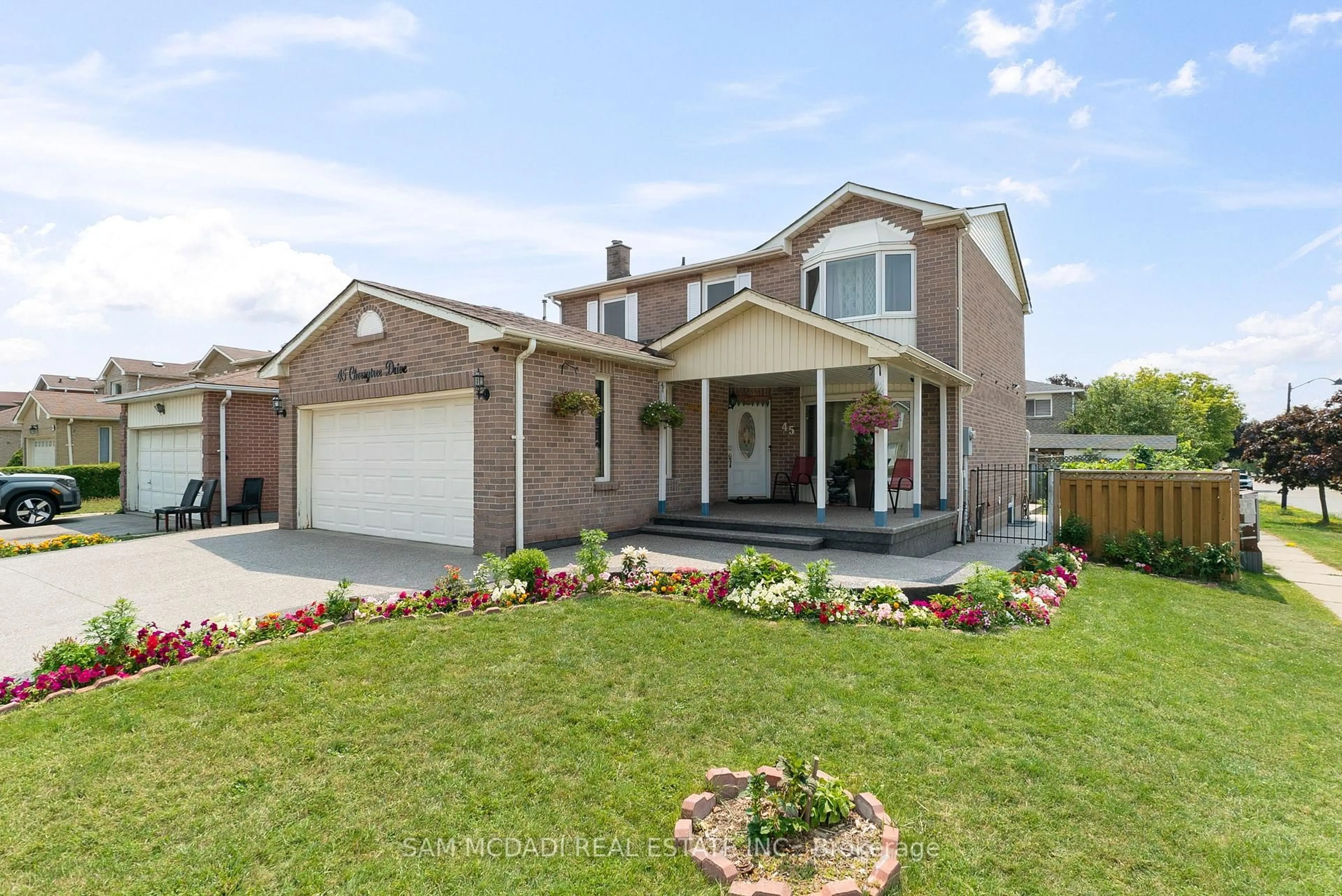 Home with brick exterior material, street for 45 Cherrytree Dr, Brampton Ontario L6Y 3P7