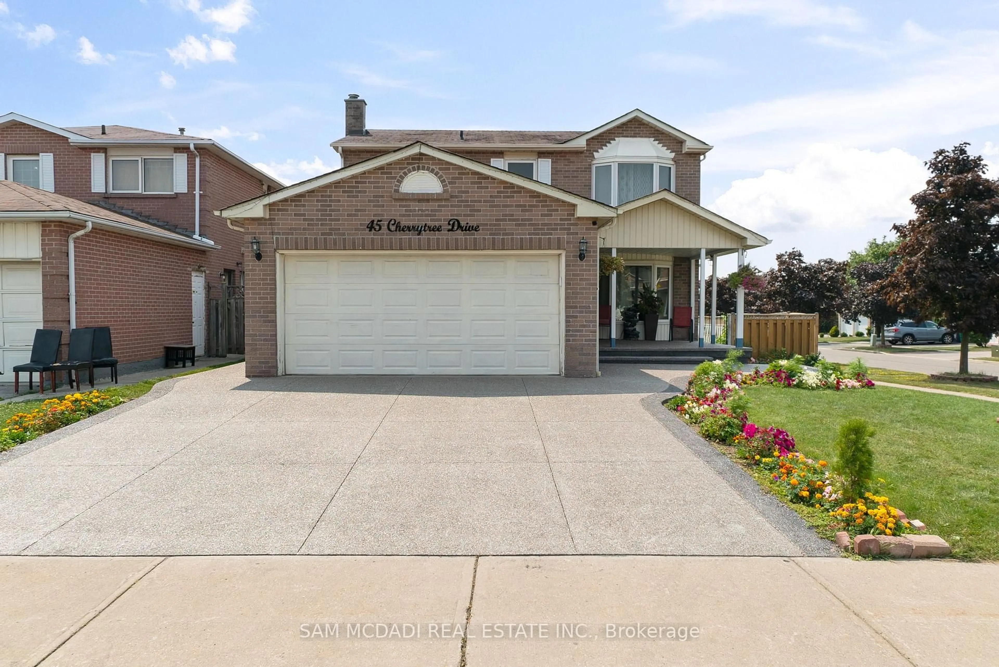 Home with brick exterior material, street for 45 Cherrytree Dr, Brampton Ontario L6Y 3P7