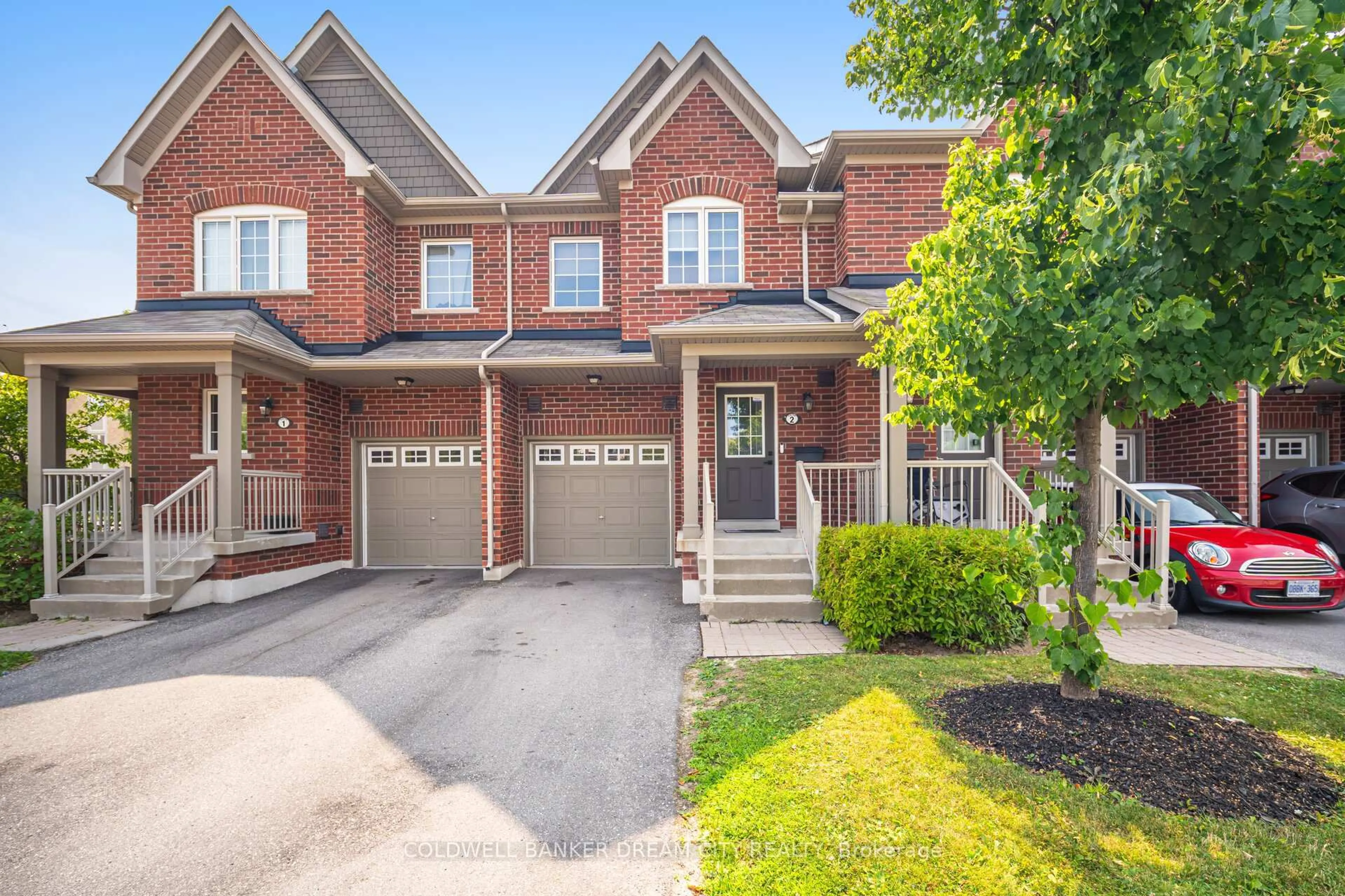 Home with brick exterior material, street for 5030 Harvard Rd #2, Mississauga Ontario L5M 0X1