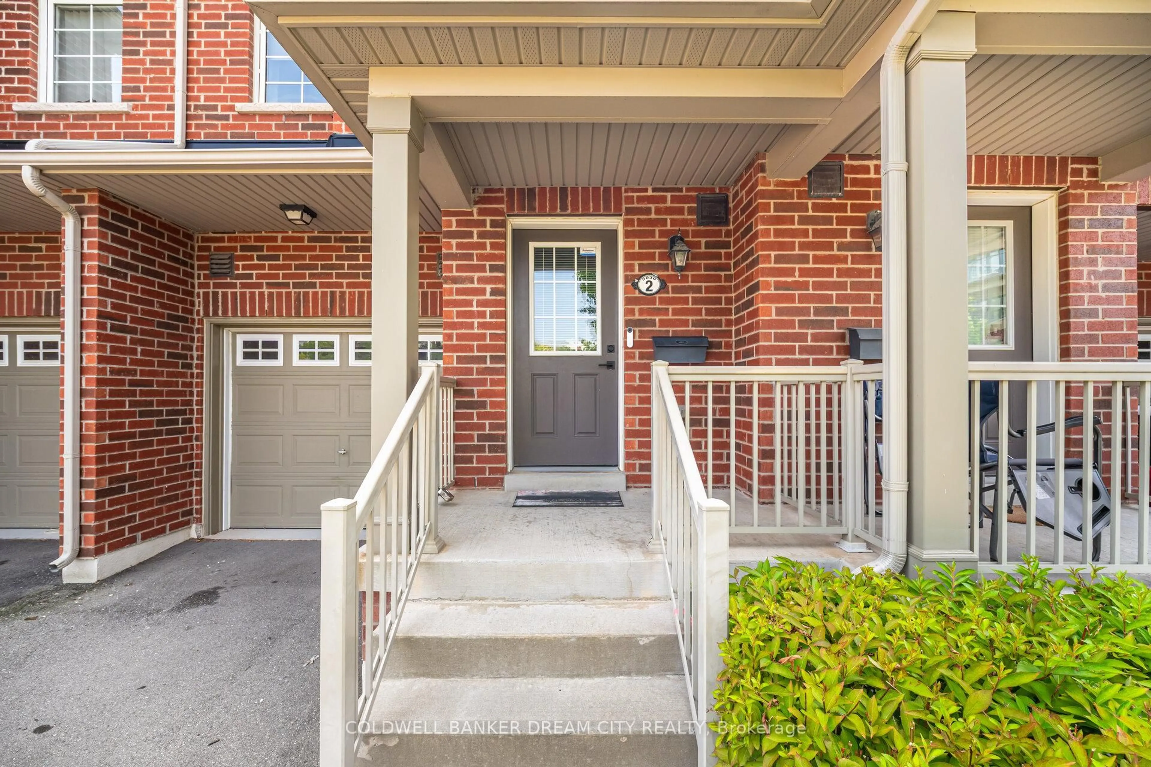 Home with brick exterior material, street for 5030 Harvard Rd #2, Mississauga Ontario L5M 0X1
