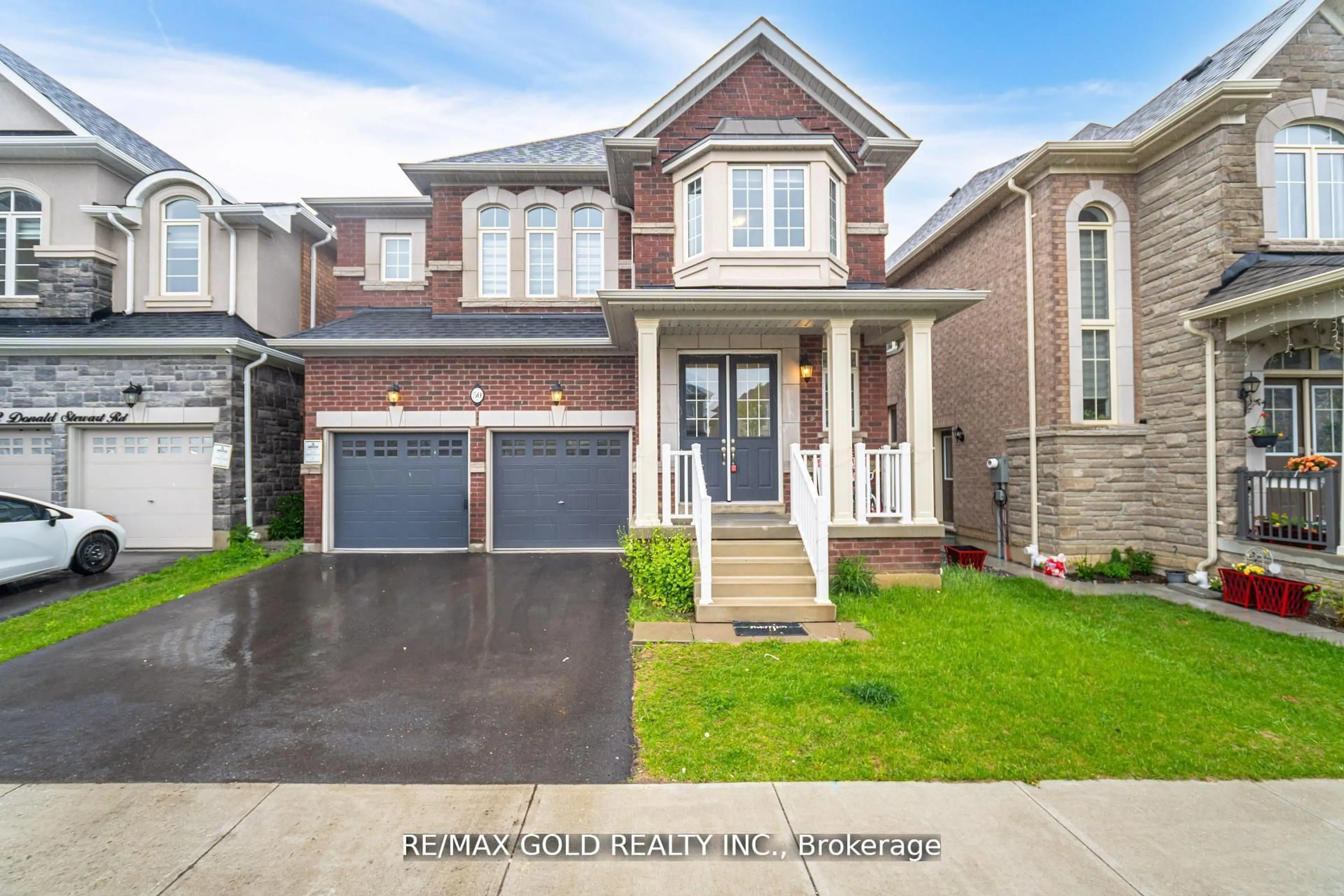 Home with brick exterior material, street for 50 Donald Stewart Rd, Brampton Ontario L7A 5J1