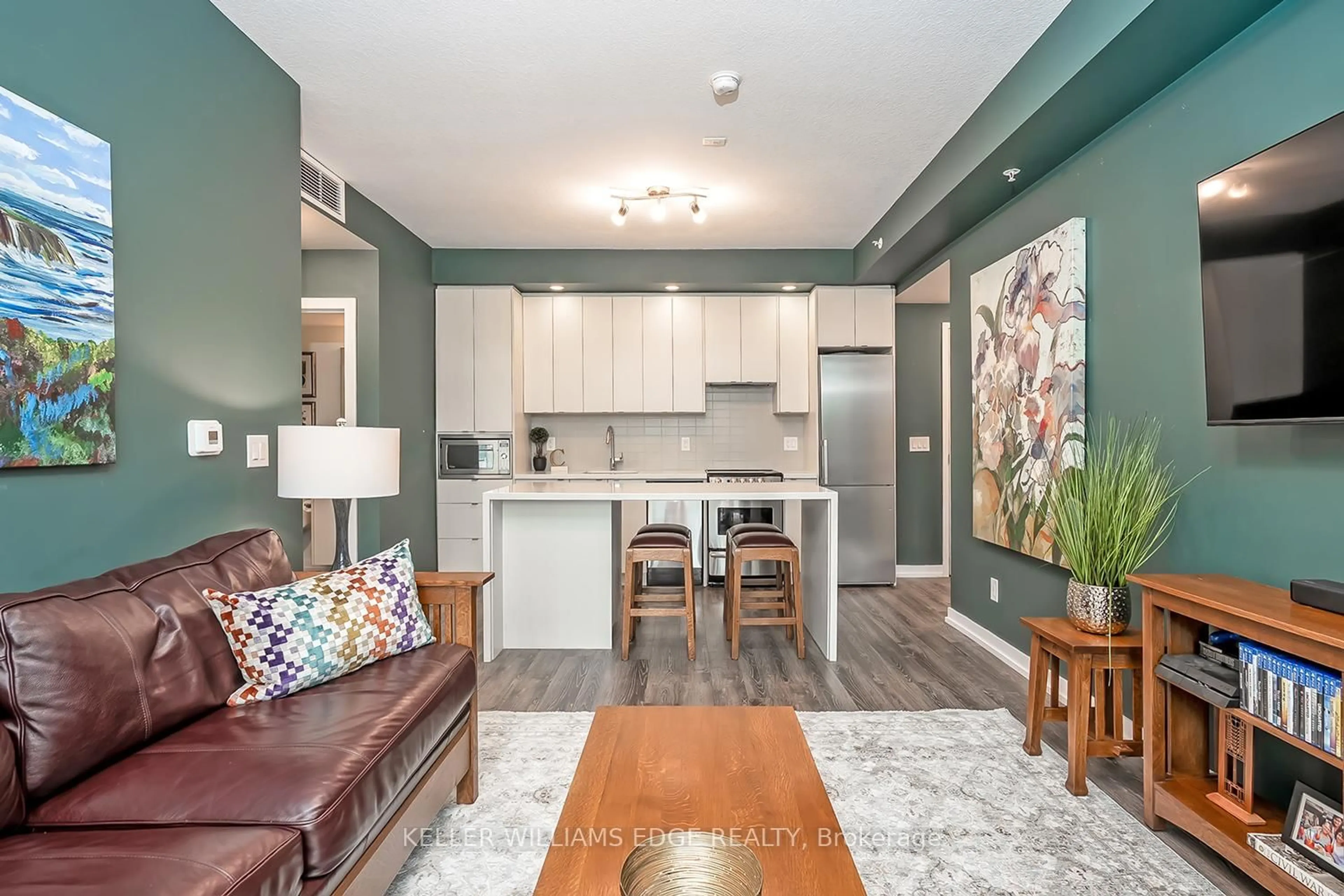 Open concept kitchen, wood/laminate floor for 457 Plains Rd #302, Burlington Ontario L7T 0B8