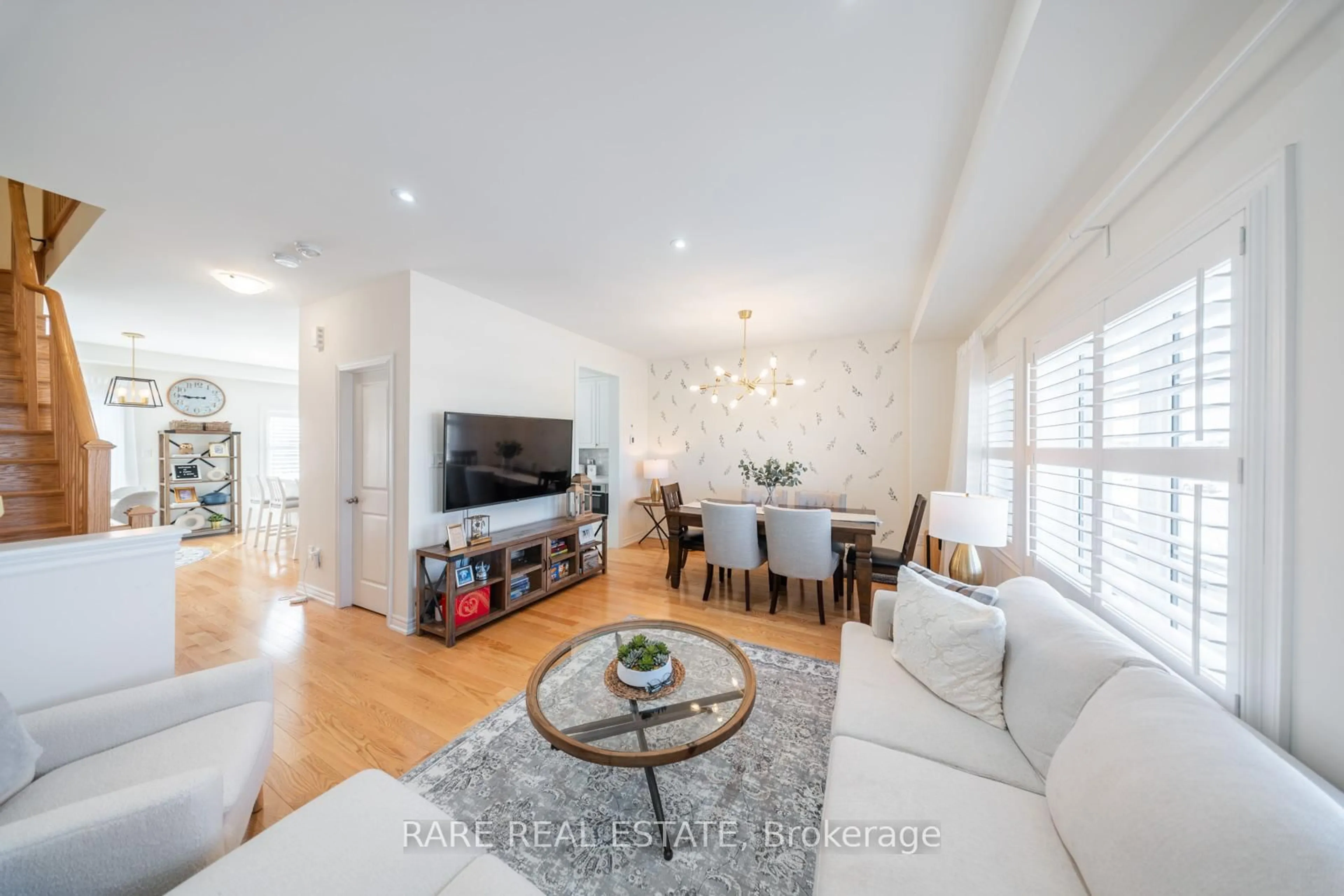 Living room with furniture, wood/laminate floor for 160 Fruitvale Circ, Brampton Ontario L7A 5C4