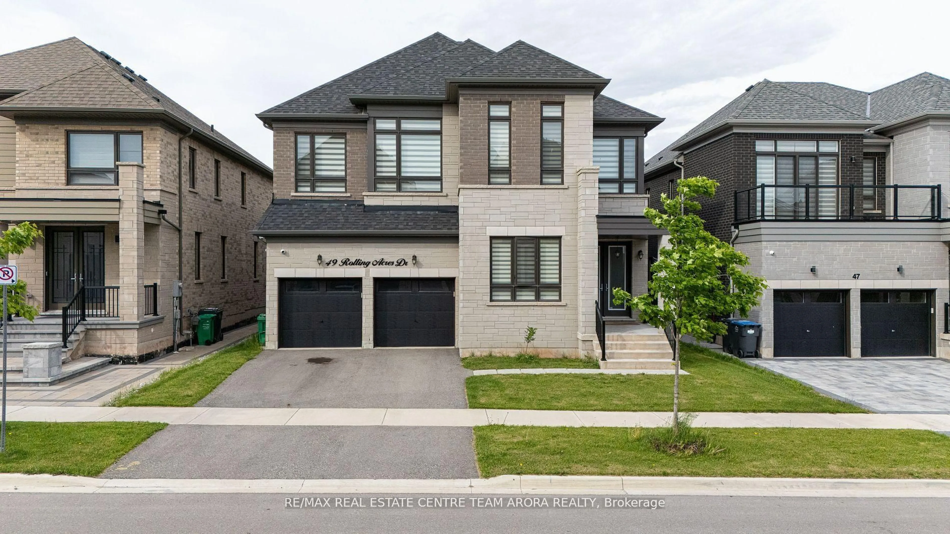Home with brick exterior material, street for 49 Rolling Acres Dr, Brampton Ontario L6X 5R2