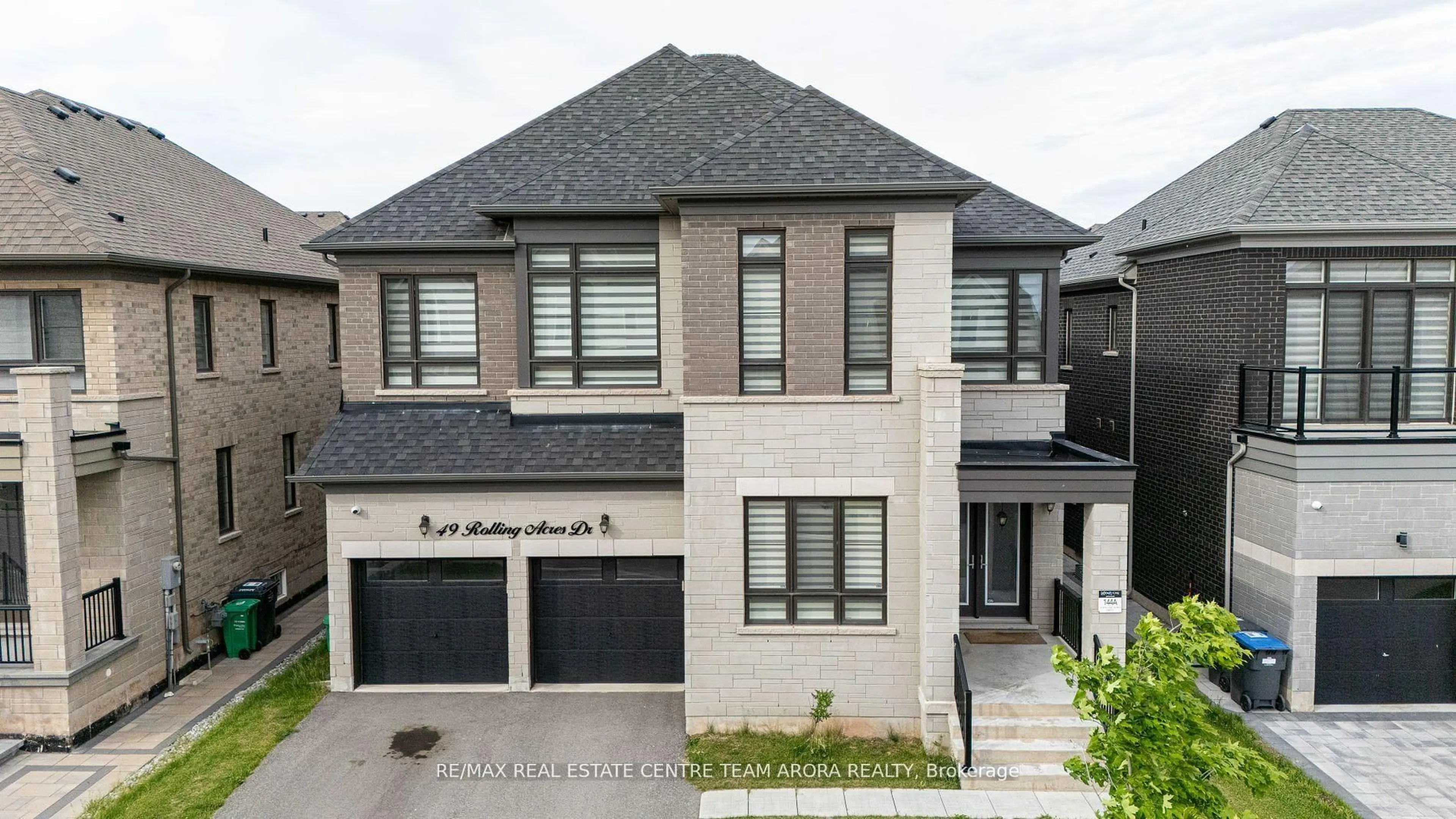 Home with brick exterior material, street for 49 Rolling Acres Dr, Brampton Ontario L6X 5R2
