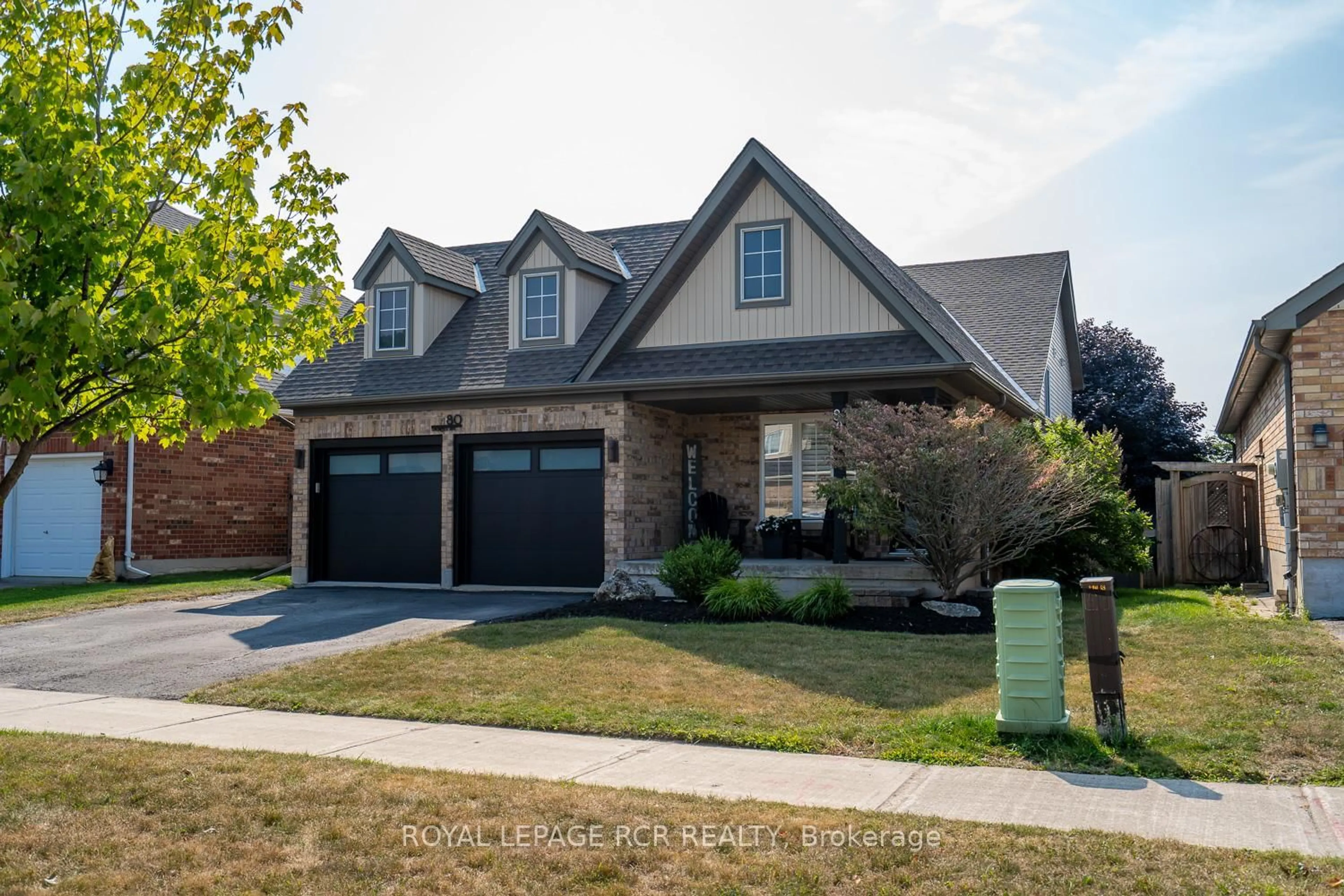 Home with brick exterior material, street for 80 Spencer Ave, Orangeville Ontario L9W 5E7