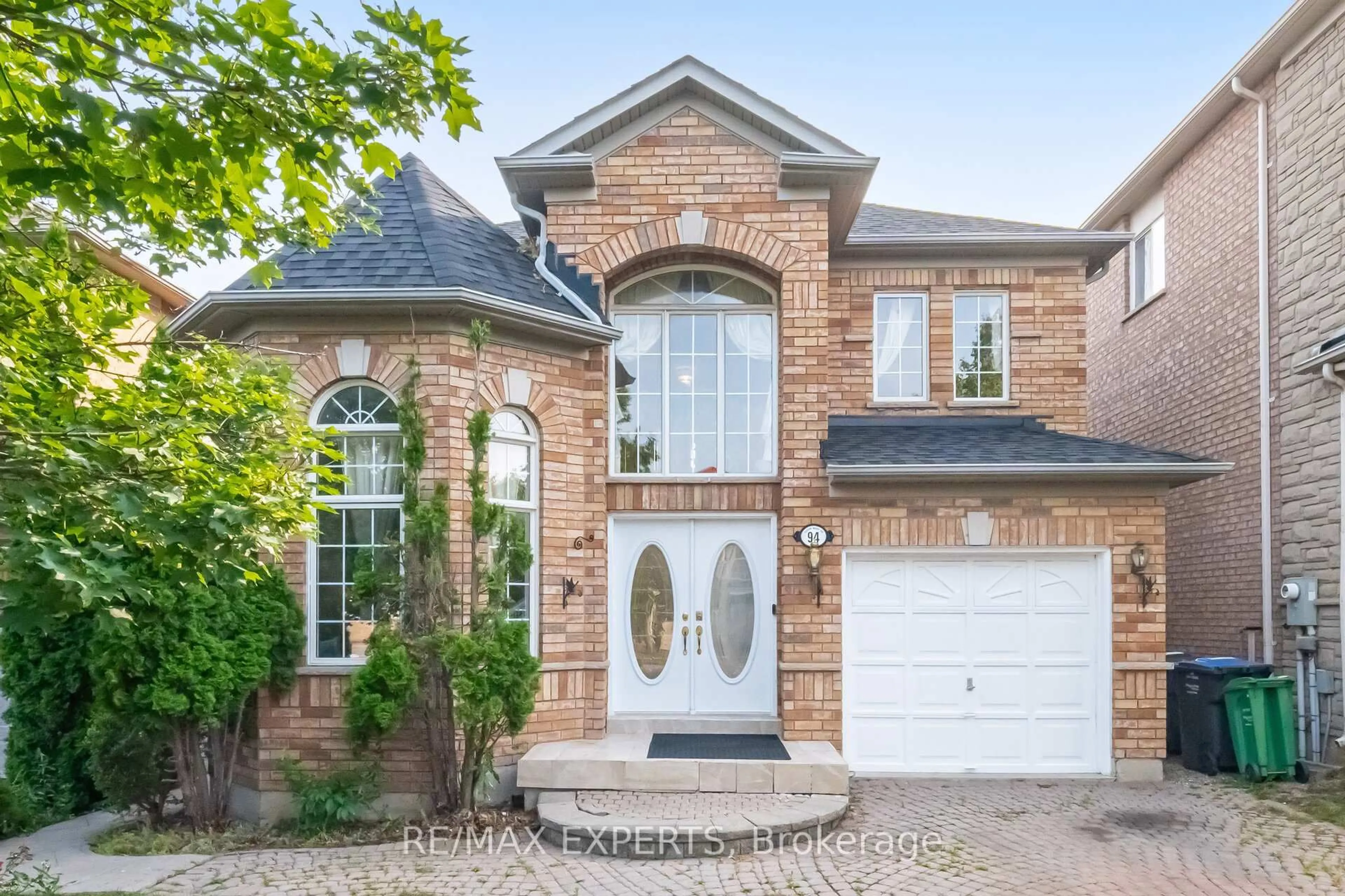 Home with brick exterior material, street for 94 Queen Mary Dr, Brampton Ontario L7A 2K7