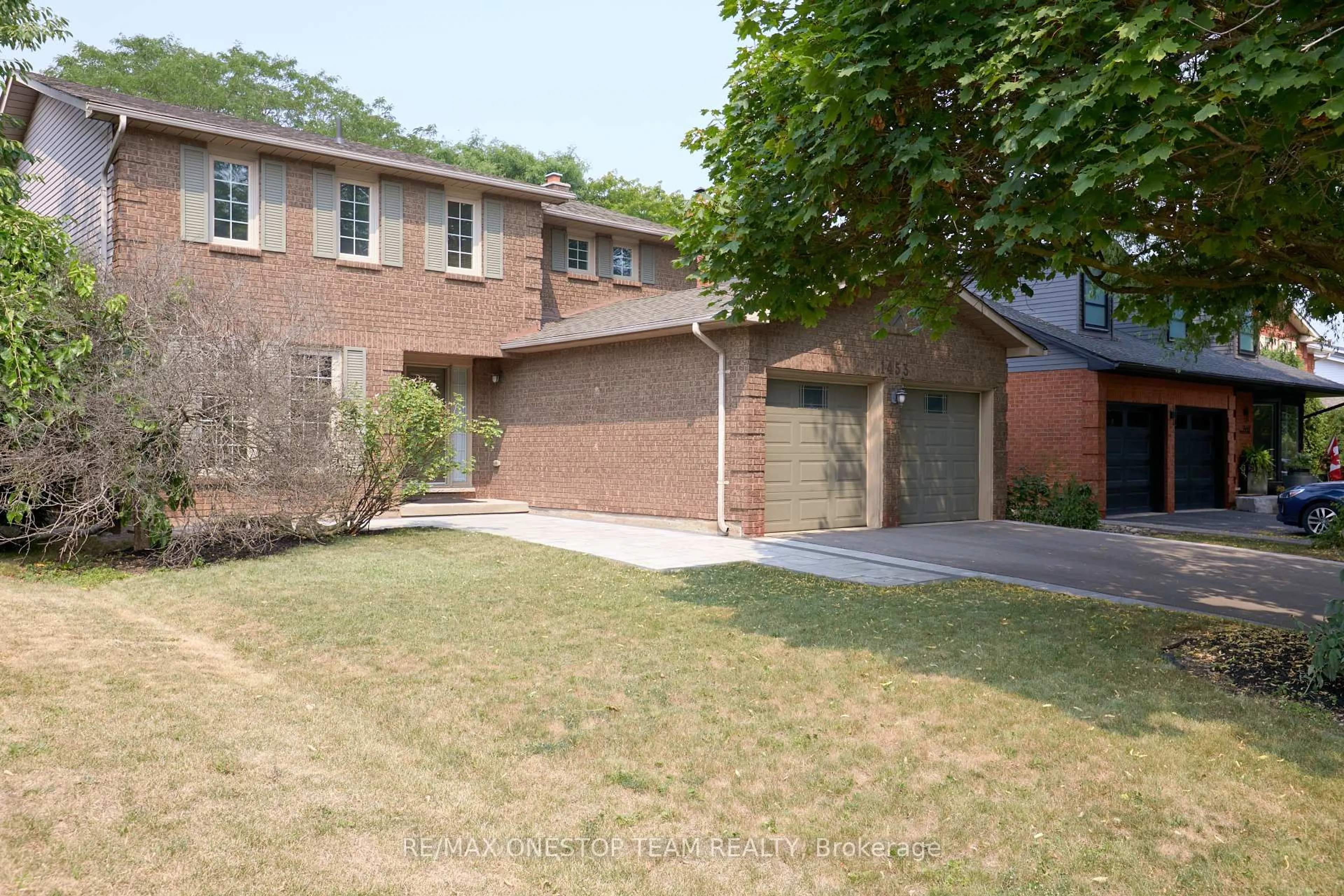 Home with brick exterior material, street for 1453 Thistledown Rd, Oakville Ontario L6M 1Z1