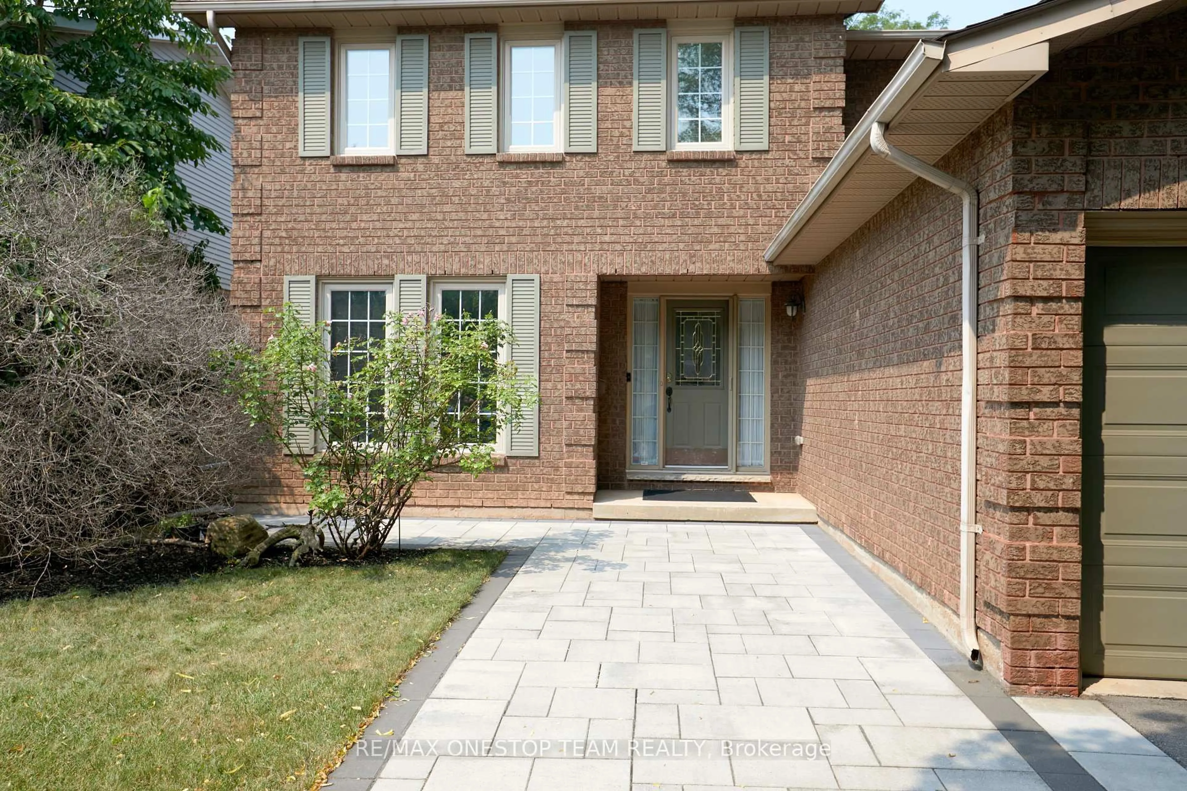 Home with brick exterior material, street for 1453 Thistledown Rd, Oakville Ontario L6M 1Z1