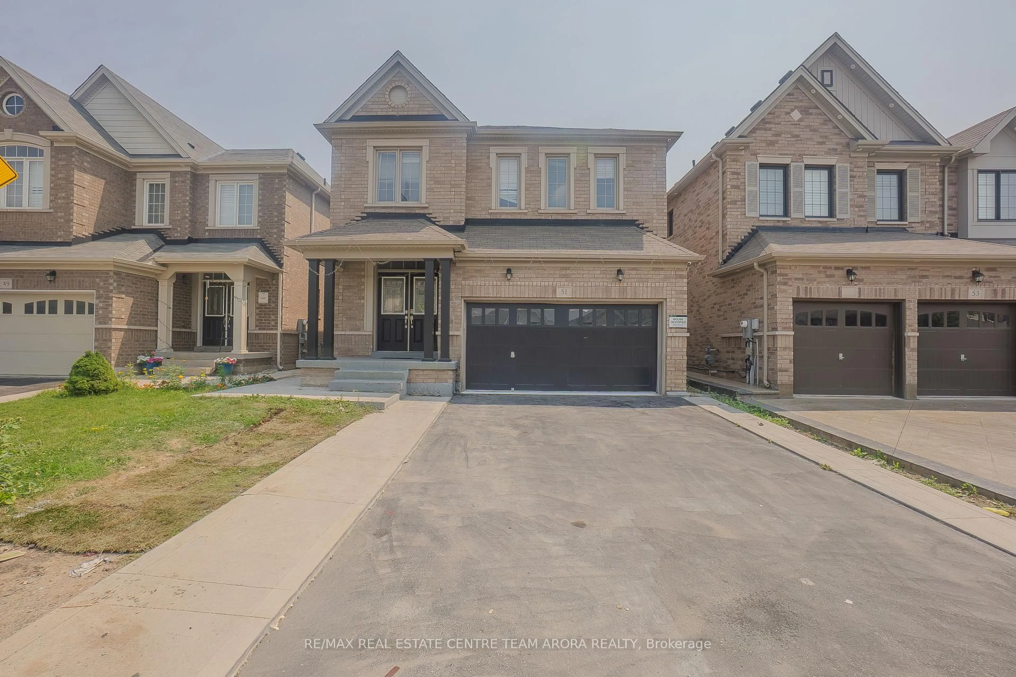 Home with brick exterior material, street for 51 Elwin Rd, Brampton Ontario L6X 5J7