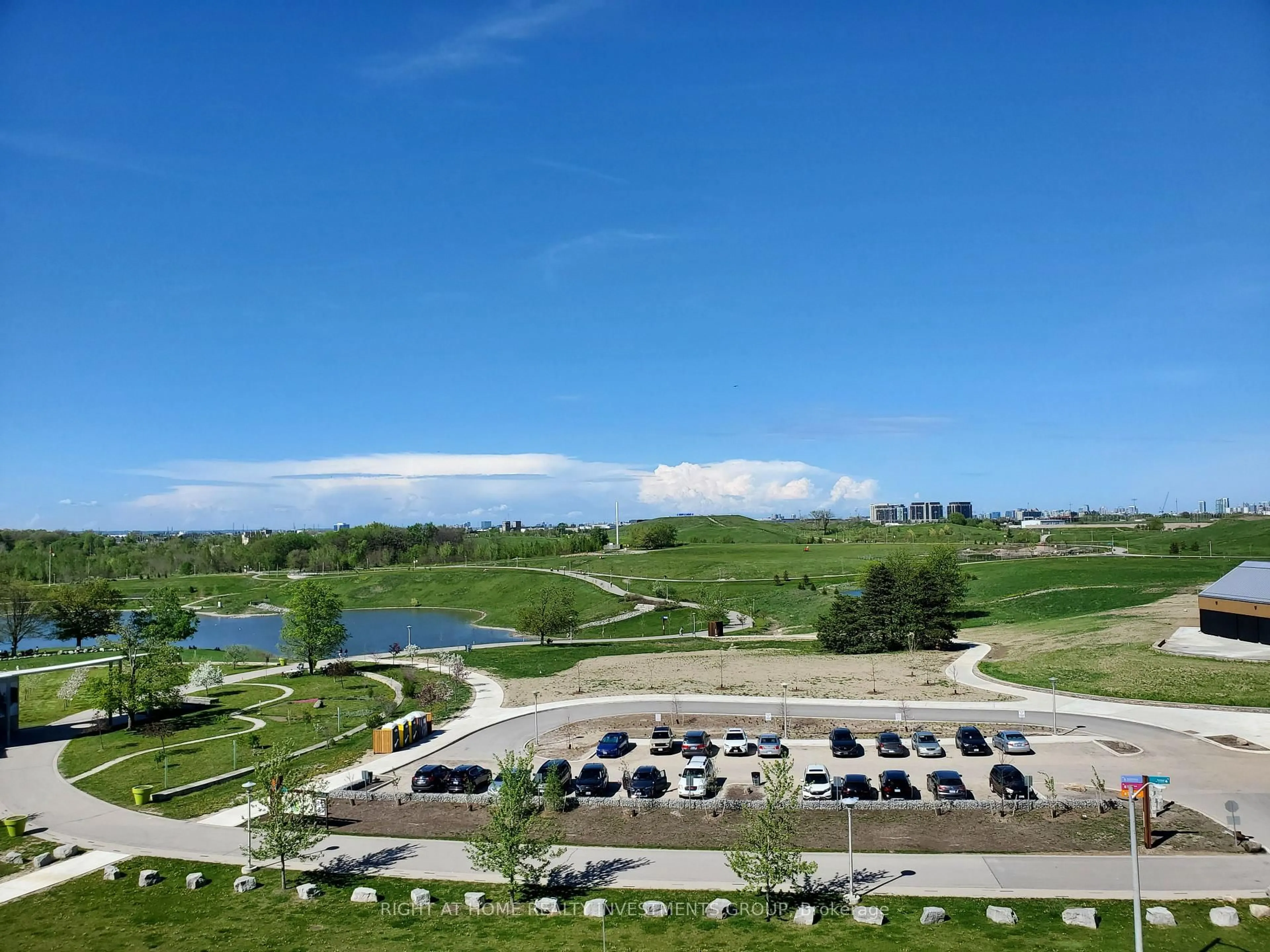 A pic from outside/outdoor area/front of a property/back of a property/a pic from drone, water/lake/river/ocean view for 60 George Butchart Dr #506, Toronto Ontario M3K 0E1