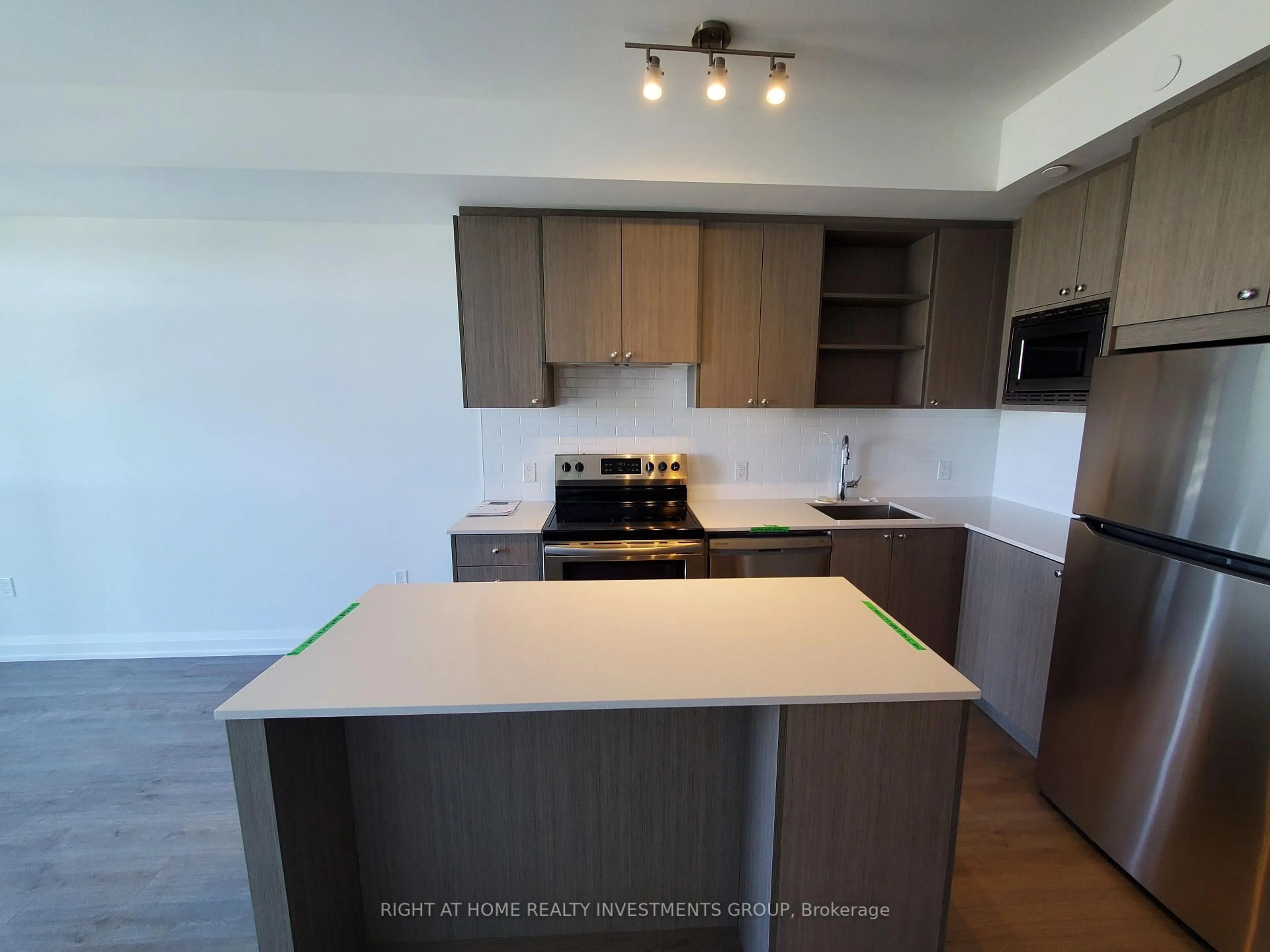Standard kitchen, wood/laminate floor for 60 George Butchart Dr #506, Toronto Ontario M3K 0E1