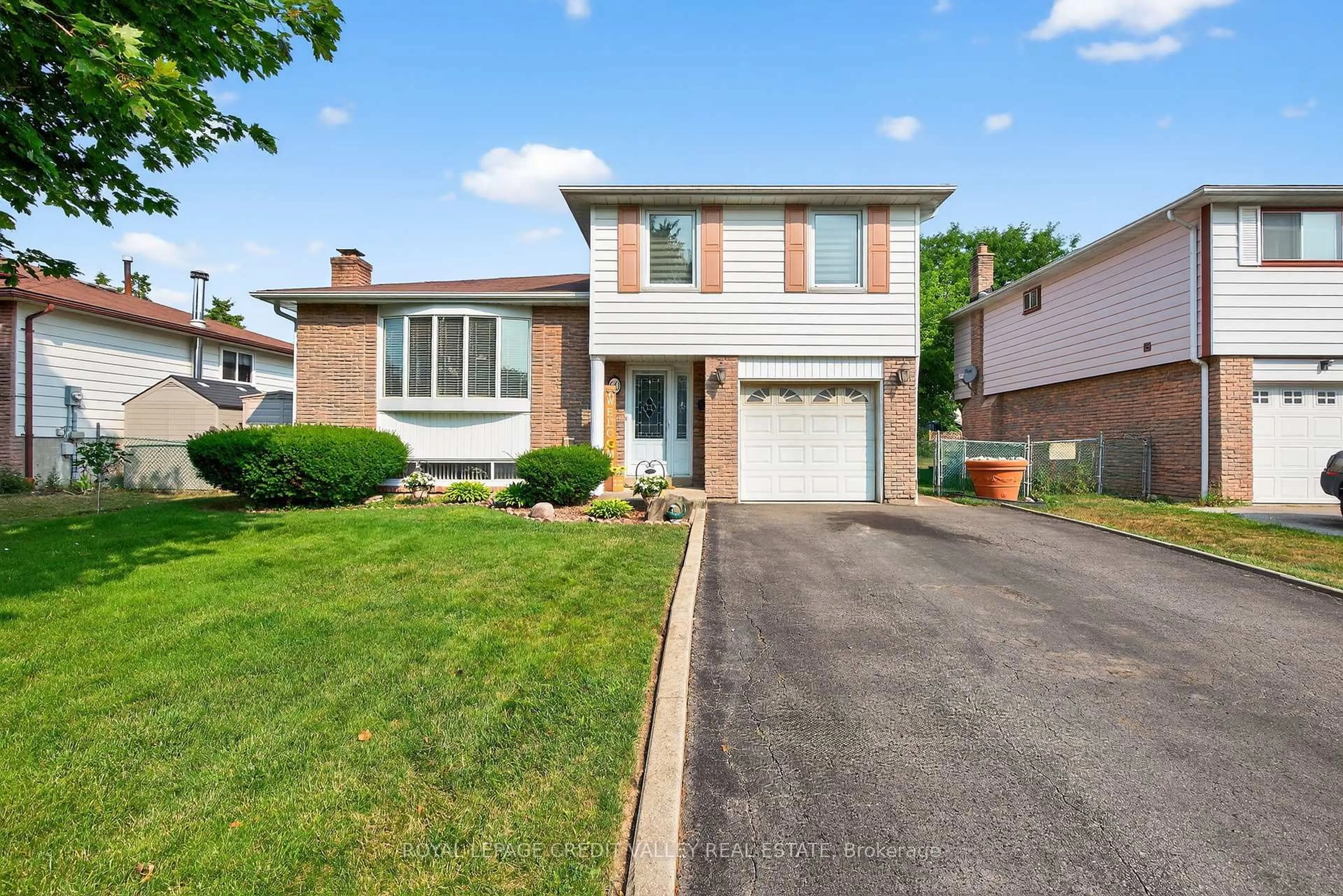 Home with brick exterior material, street for 60 Gondola Cres, Brampton Ontario L6S 1W6
