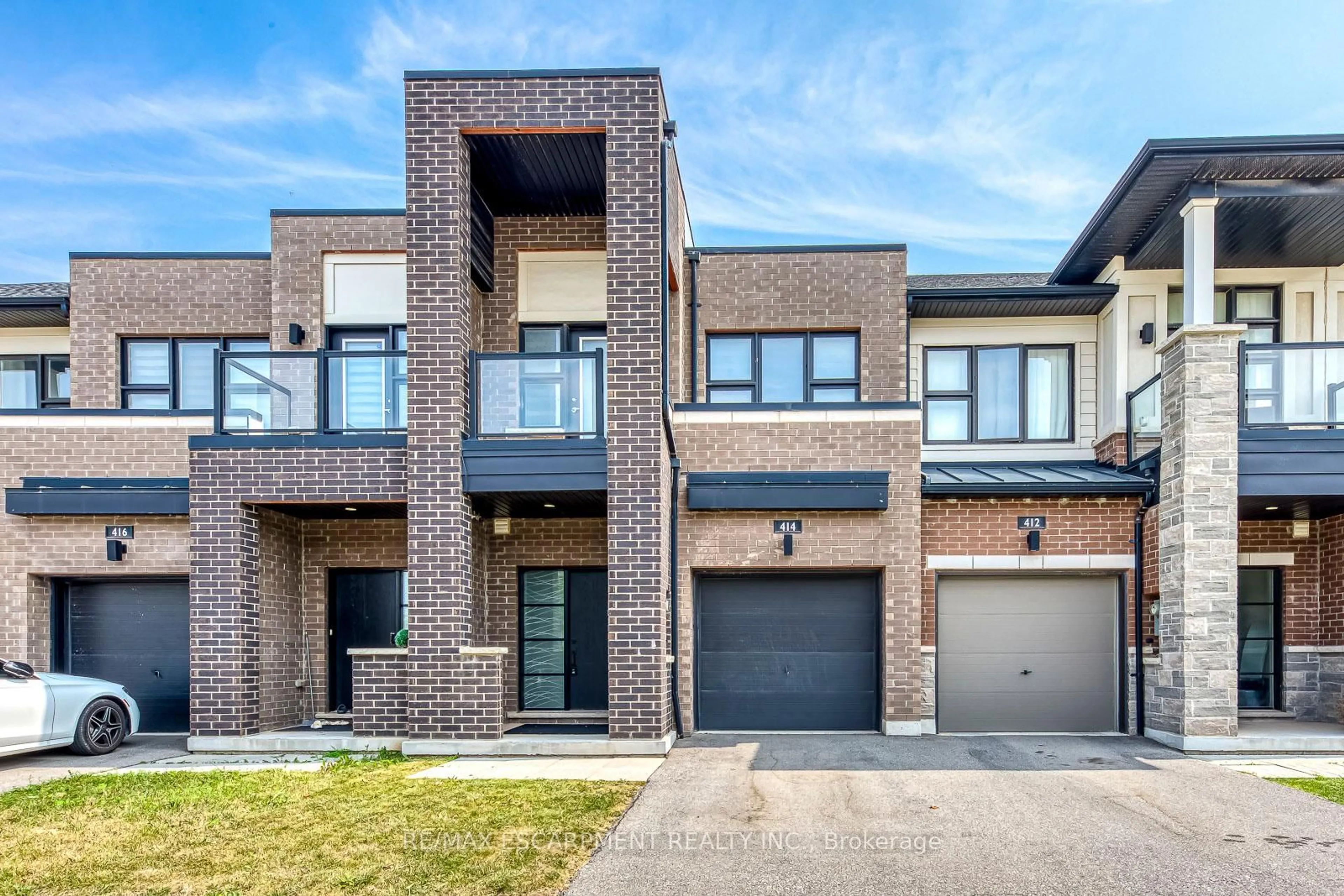 Home with brick exterior material, street for 414 Wheat Boom Dr, Oakville Ontario L6H 0R4