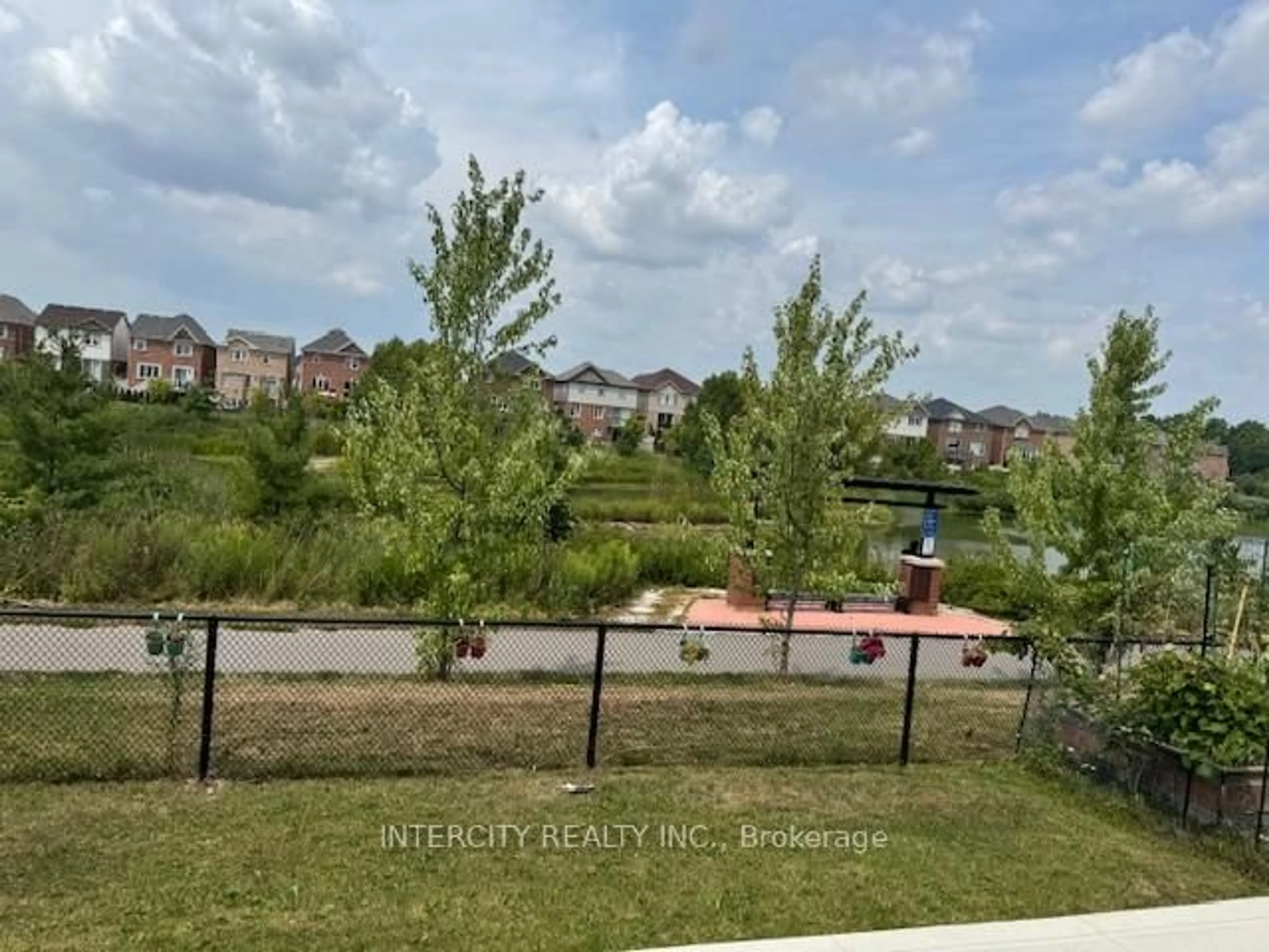 A pic from outside/outdoor area/front of a property/back of a property/a pic from drone, water/lake/river/ocean view for 39 Divers Rd, Brampton Ontario L7A 5C8