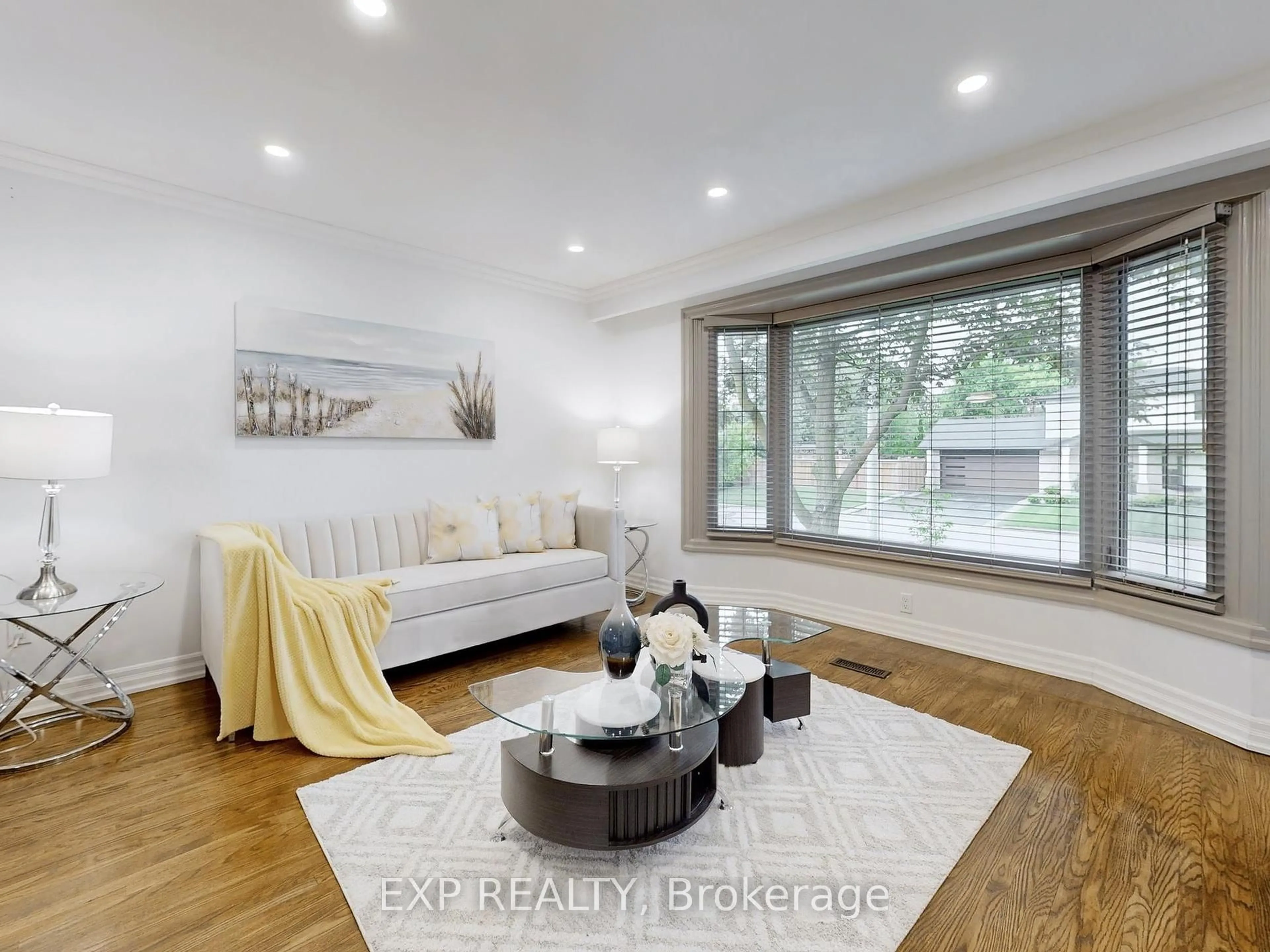 Living room with furniture, wood/laminate floor for 5 Lockton Cres, Brampton Ontario L6W 1C2
