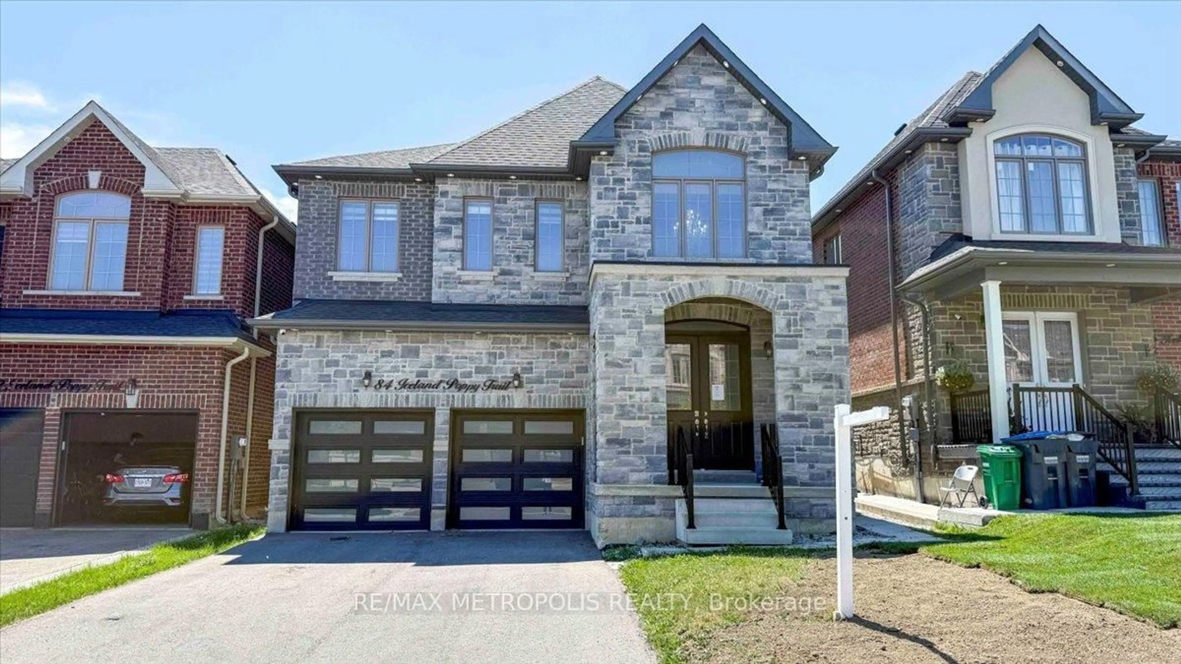 Home with brick exterior material, street for 84 Iceland Poppy Tr, Brampton Ontario L7A 0C1
