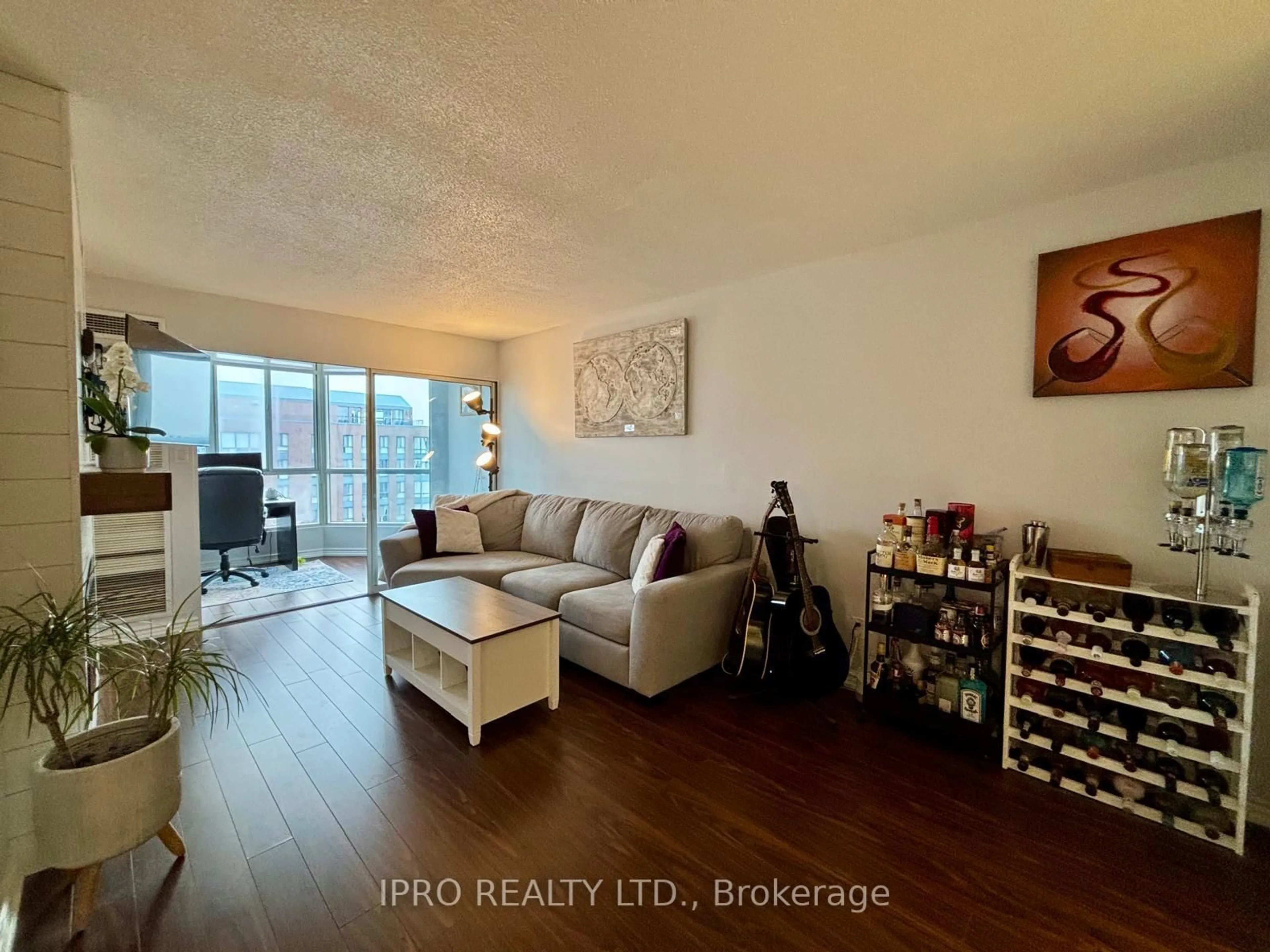 Living room with furniture, wood/laminate floor for 145 Hillcrest Ave #2310, Mississauga Ontario L5B 3Z1