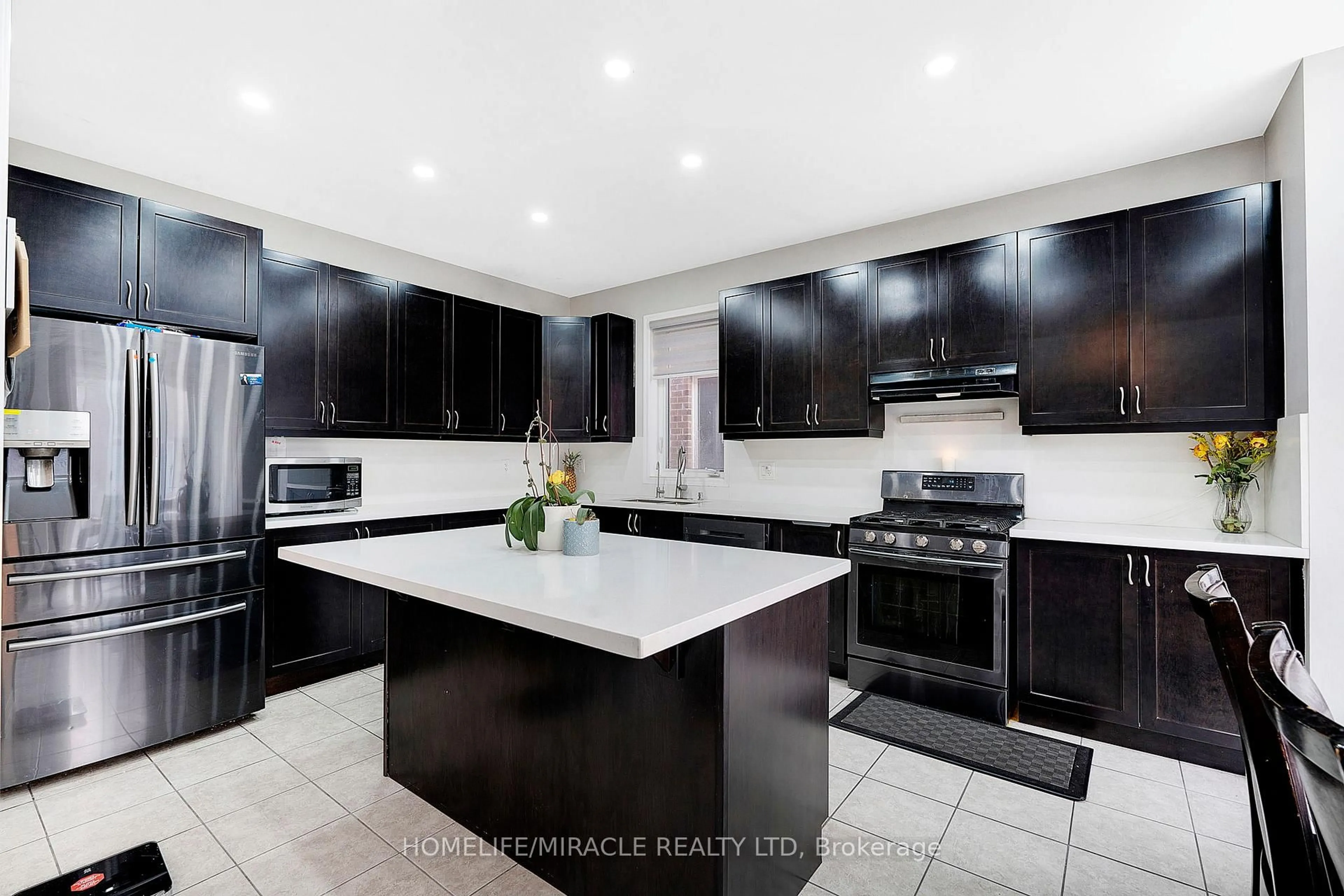 Contemporary kitchen, ceramic/tile floor for 69 Mincing Tr, Brampton Ontario L7A 4S9