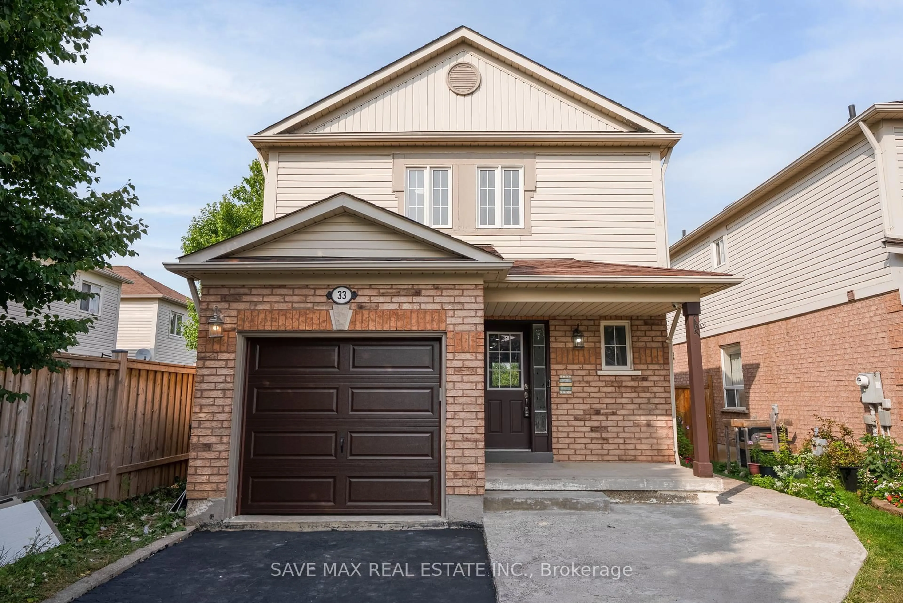Home with brick exterior material, street for 33 Heathwood Dr, Brampton Ontario L7A 1Y6