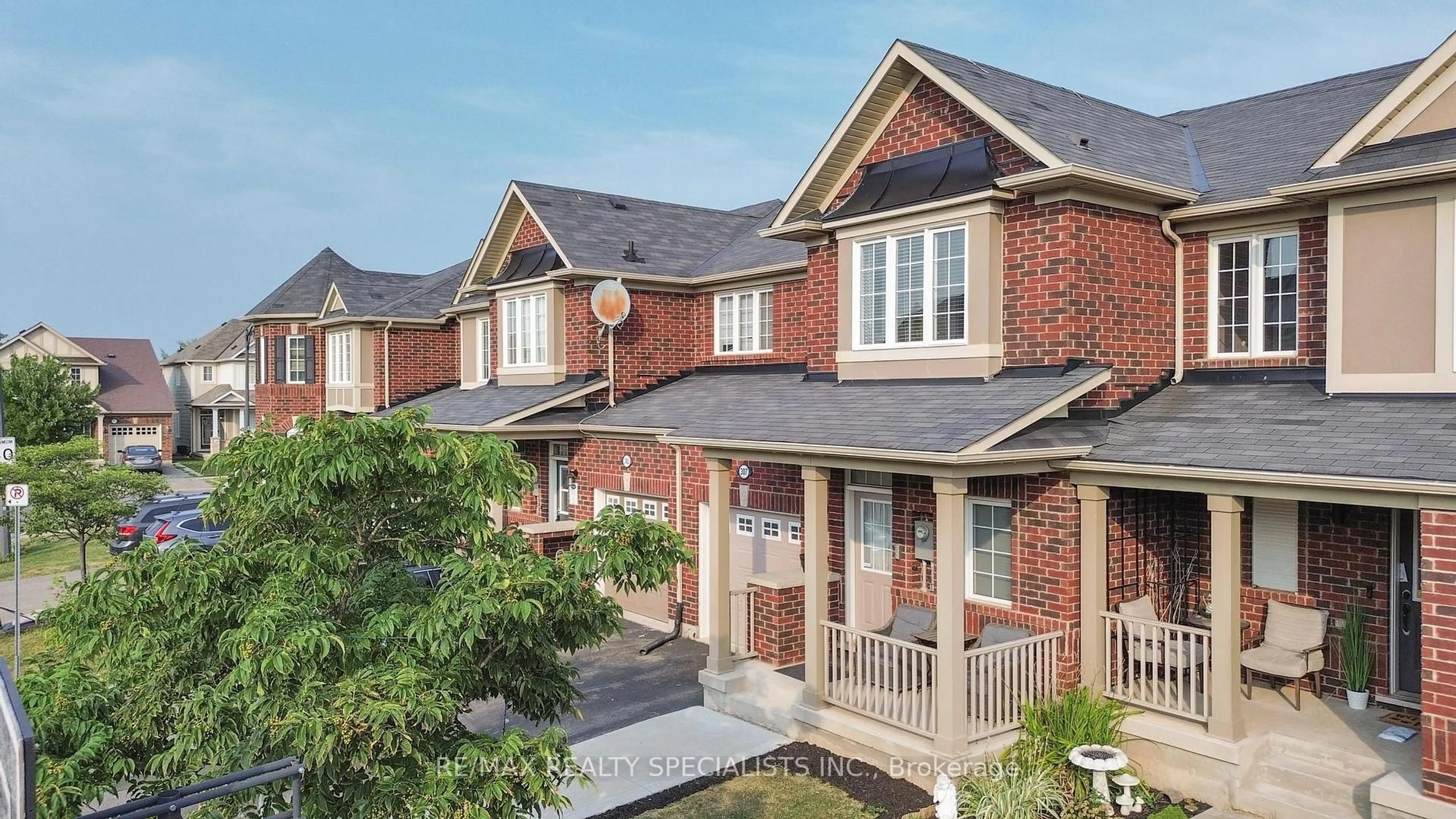 Home with brick exterior material, street for 307 Chuchmach Clse, Milton Ontario L9T 8B3