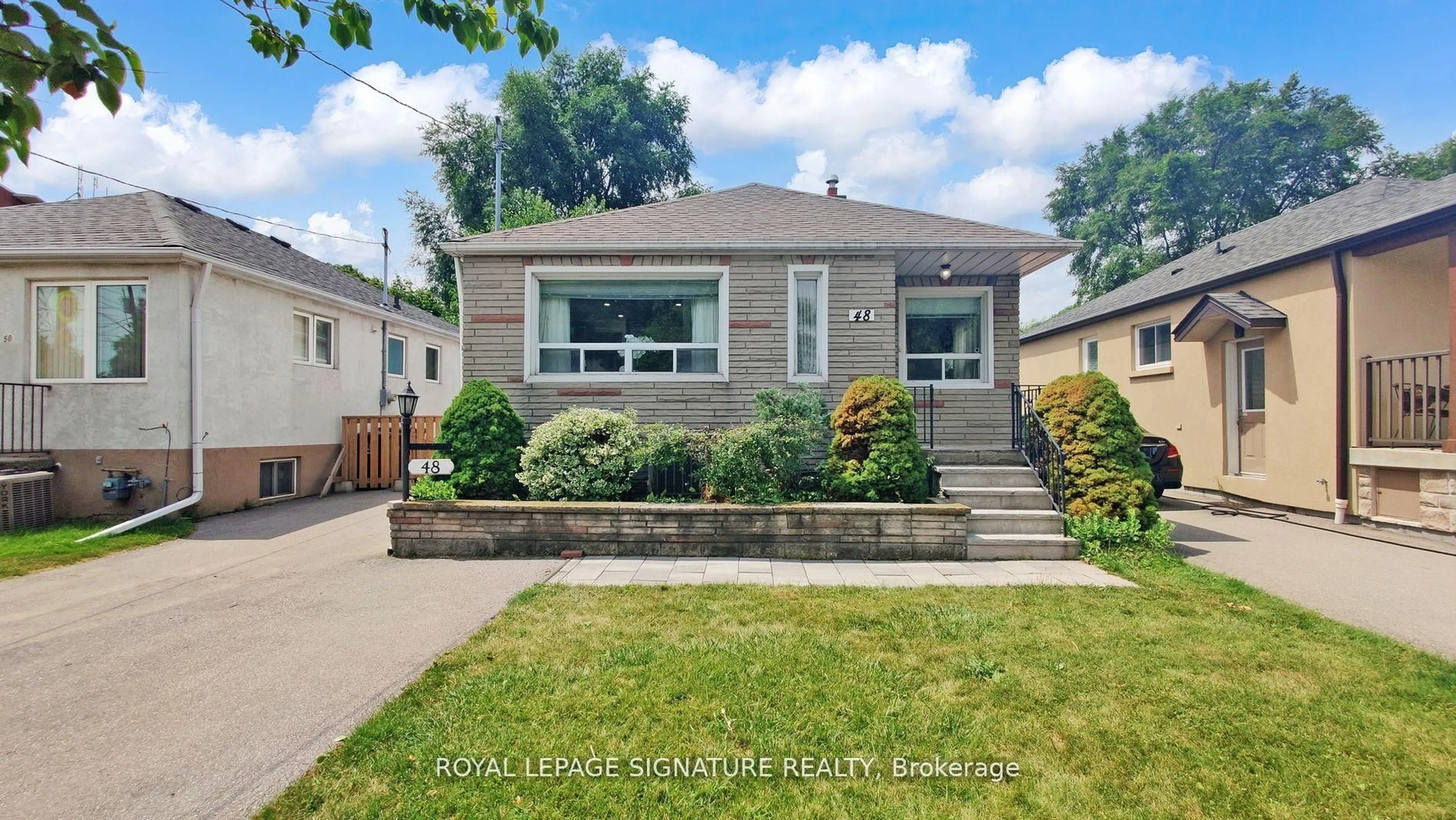 Home with vinyl exterior material, street for 48 Acorn Ave, Toronto Ontario M9B 3P9