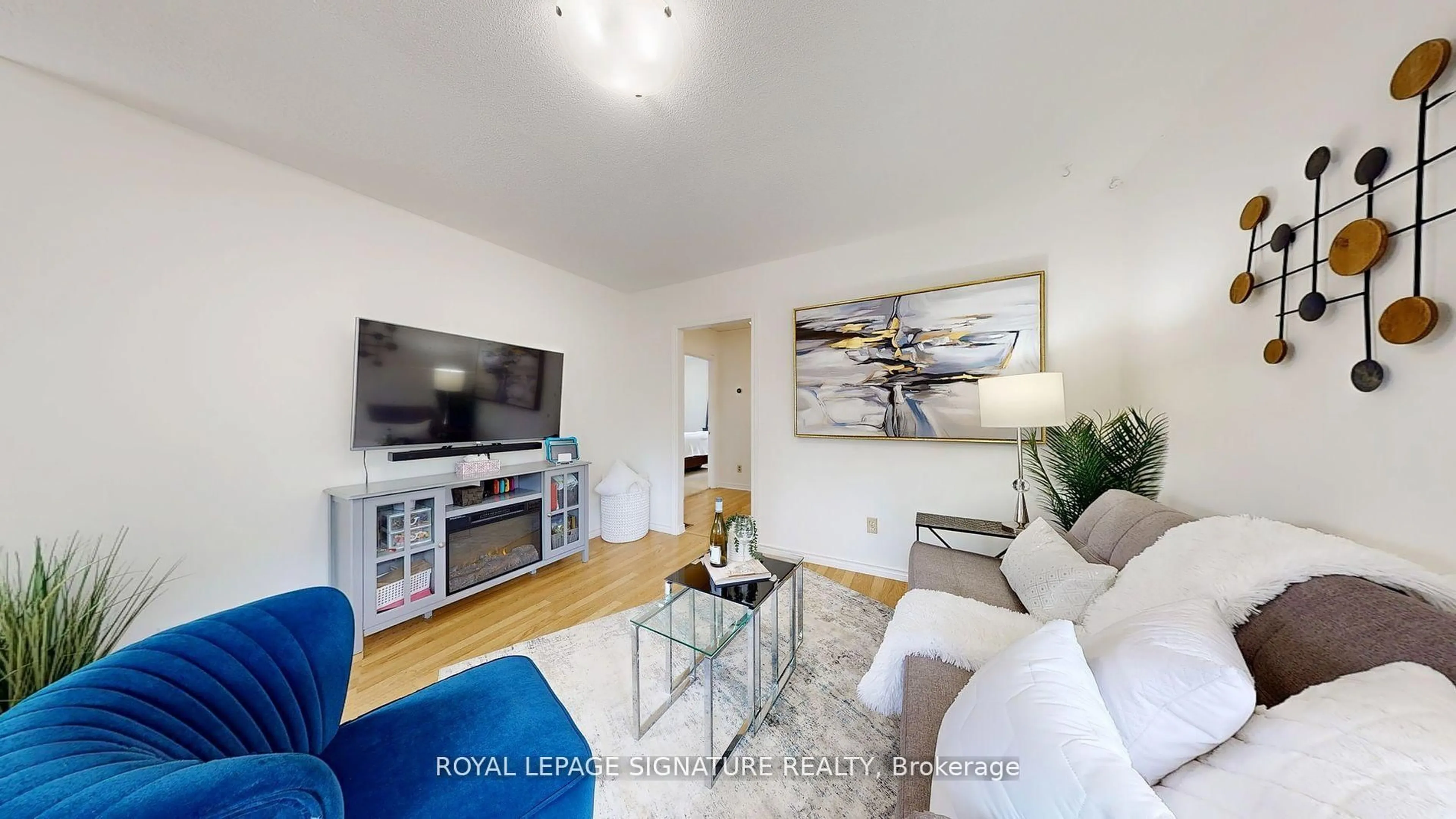 Living room with furniture, wood/laminate floor for 48 Acorn Ave, Toronto Ontario M9B 3P9