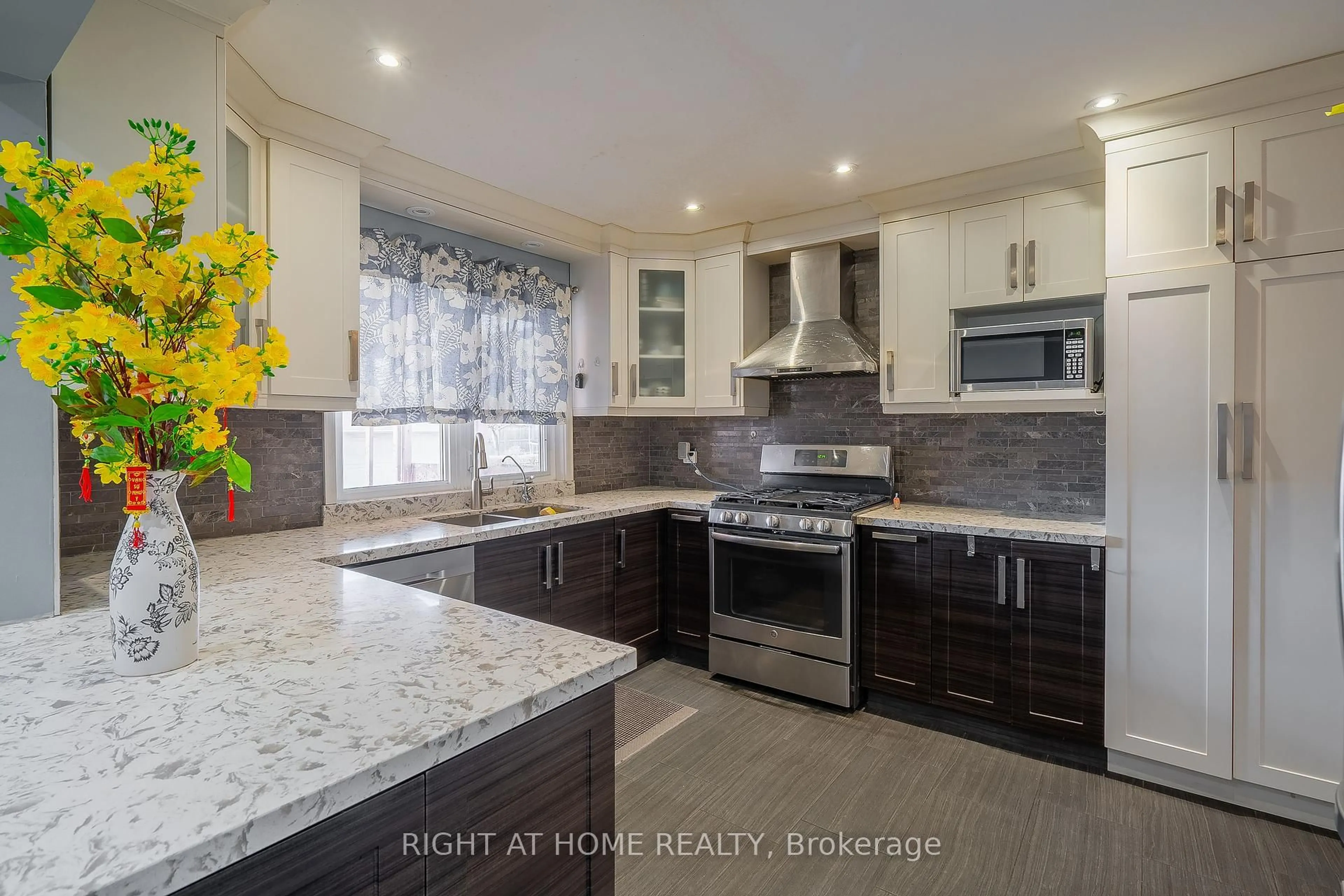 Open concept kitchen, ceramic/tile floor for 76 Habitant Dr, Toronto Ontario M9M 2P2