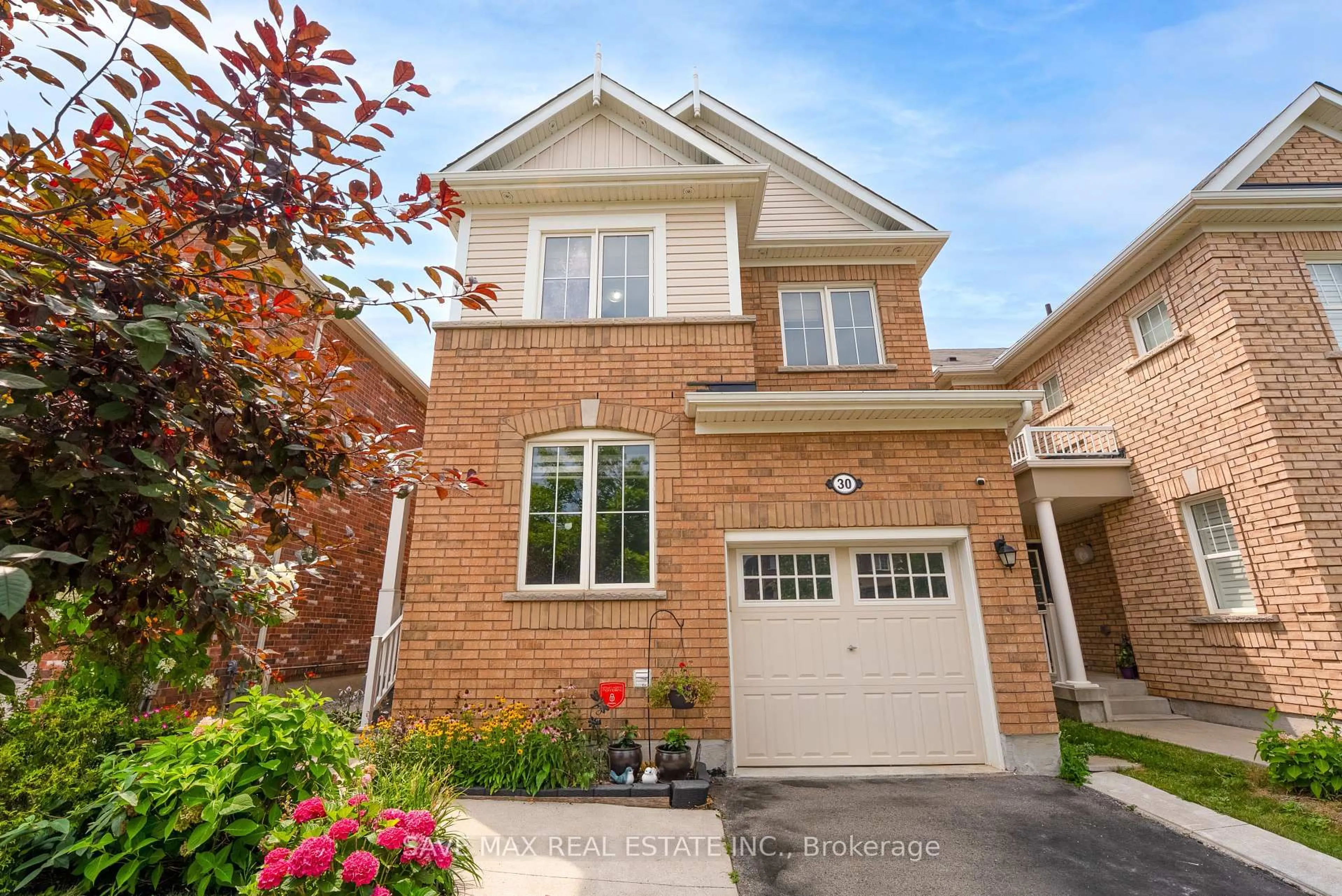 Home with brick exterior material, street for 30 Polstar Rd, Brampton Ontario L7A 0G2