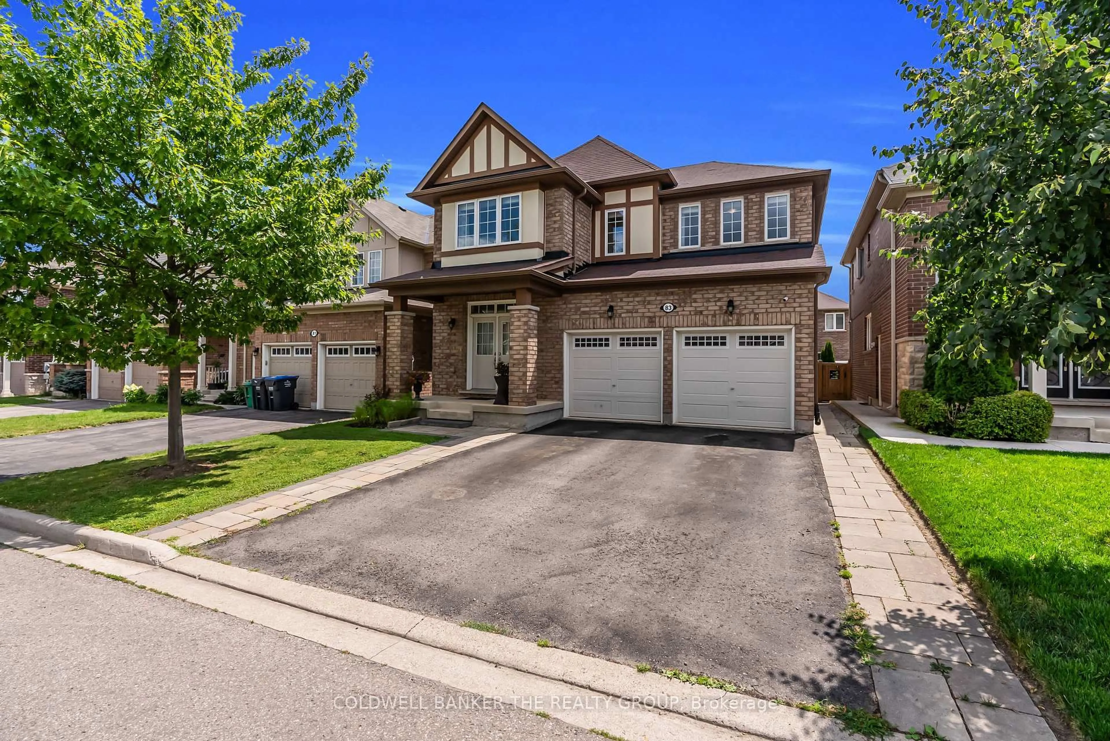 Home with brick exterior material, street for 83 Enford Cres, Brampton Ontario L7A 4C8