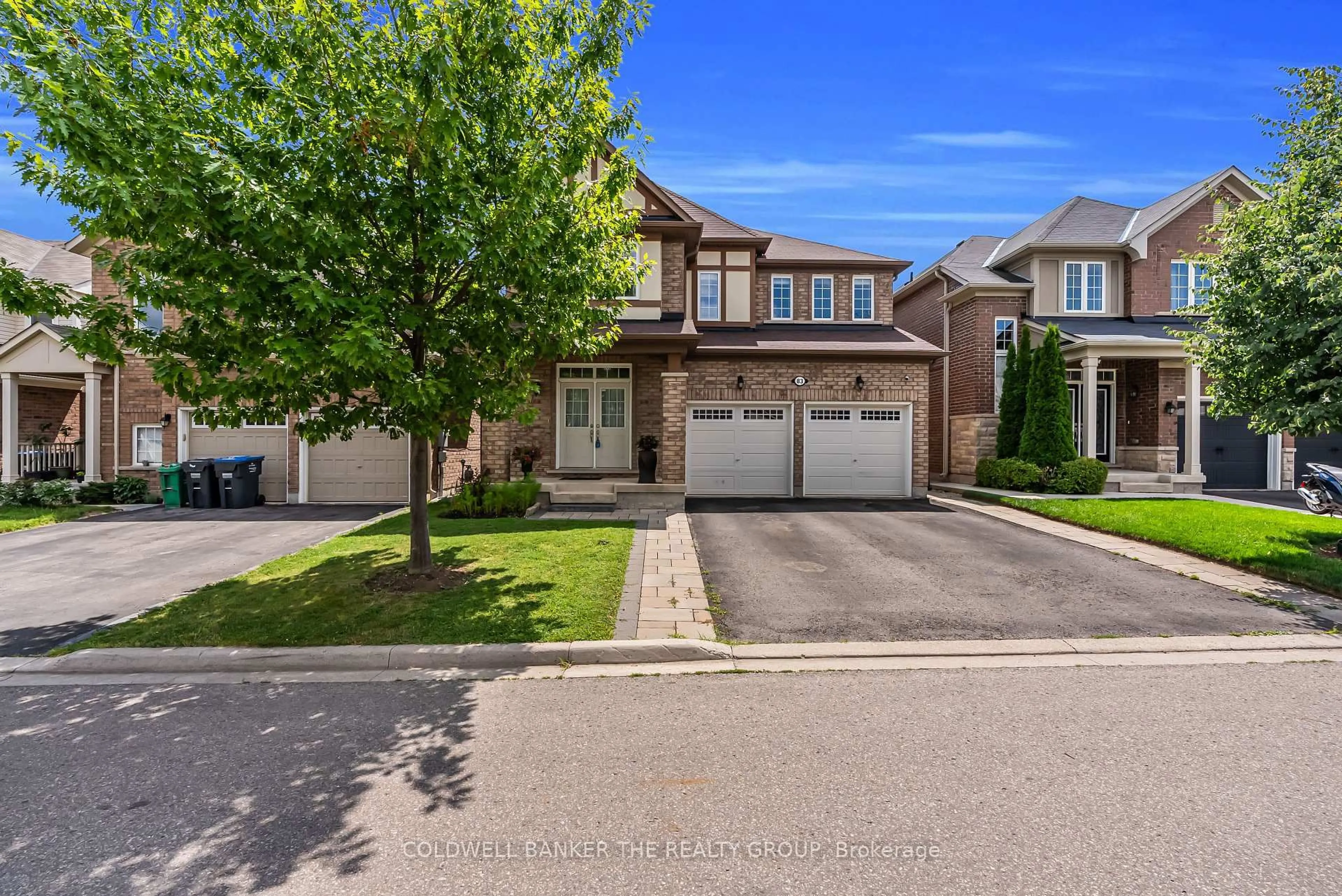 Home with brick exterior material, street for 83 Enford Cres, Brampton Ontario L7A 4C8