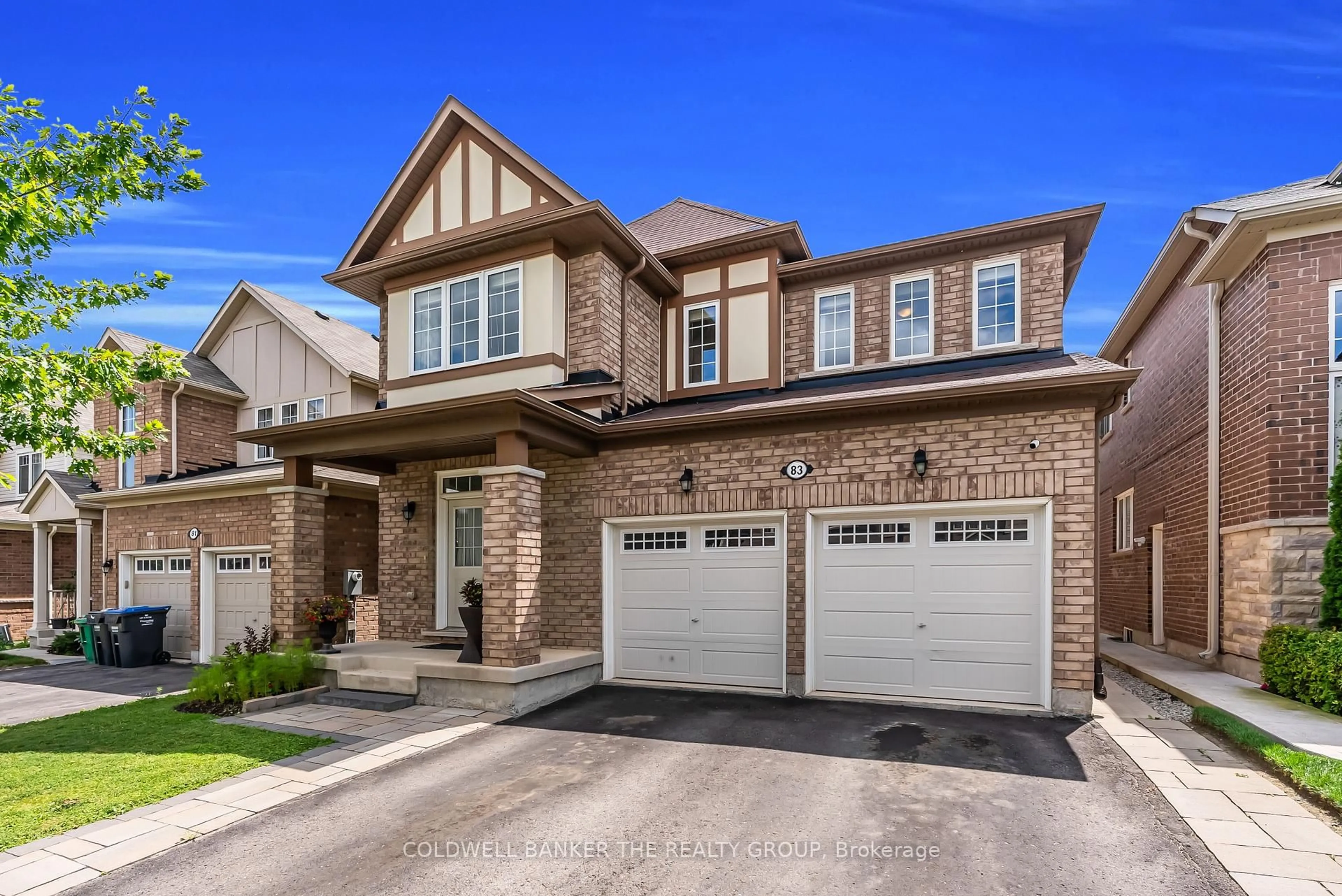 Home with brick exterior material, street for 83 Enford Cres, Brampton Ontario L7A 4C8