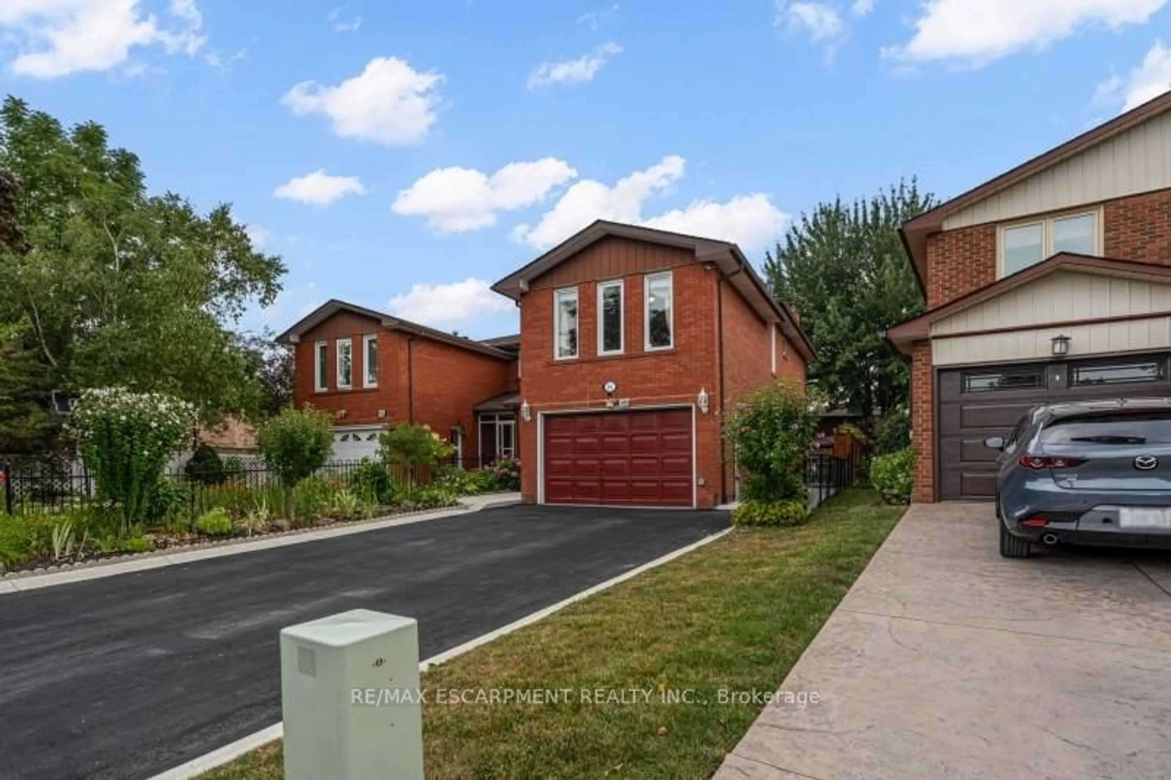 Home with brick exterior material, street for 94 Bremen Lane, Mississauga Ontario L5M 2N5