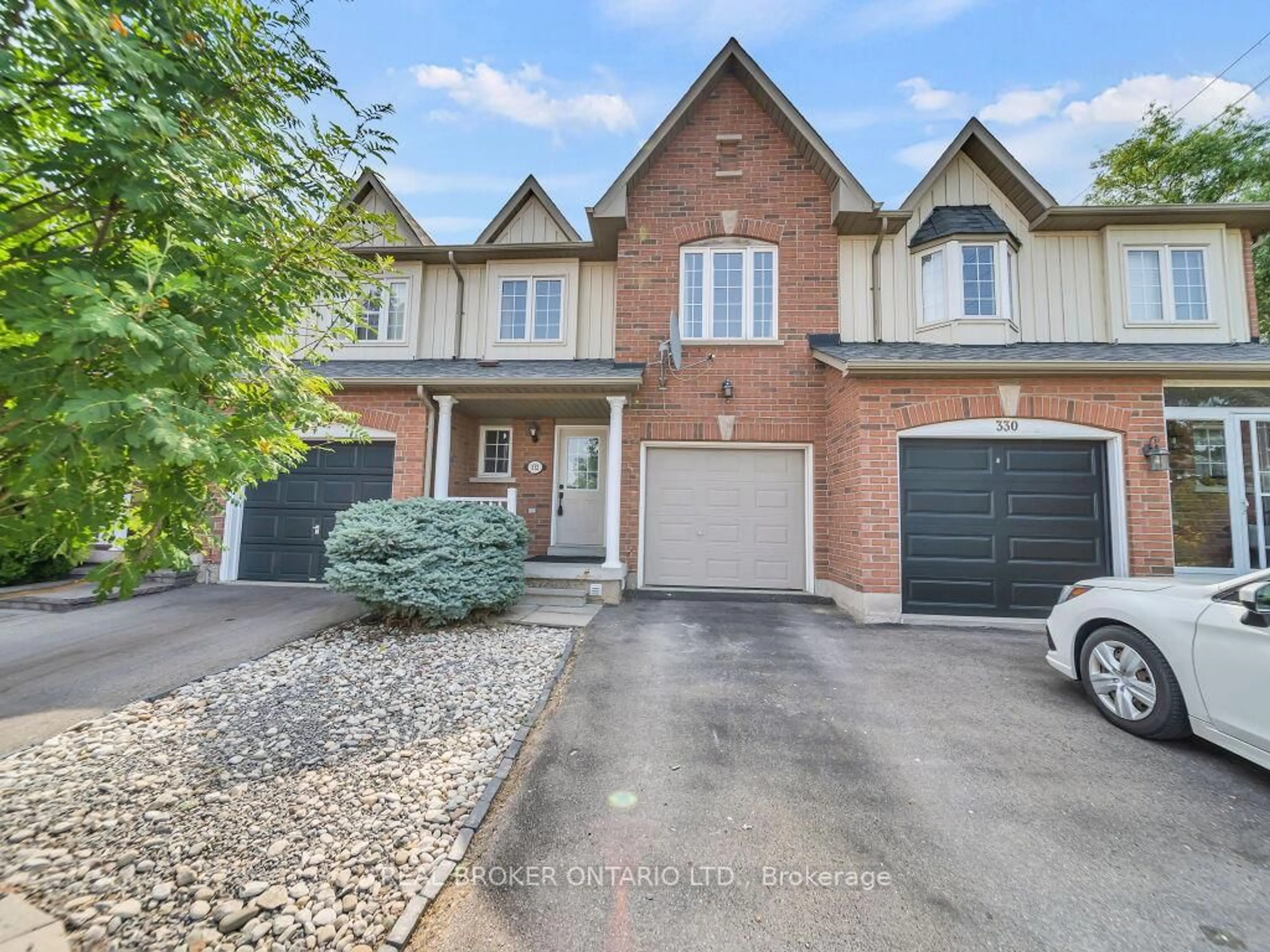 Home with brick exterior material, street for 332 Riverstone Dr, Oakville Ontario L6H 7M3