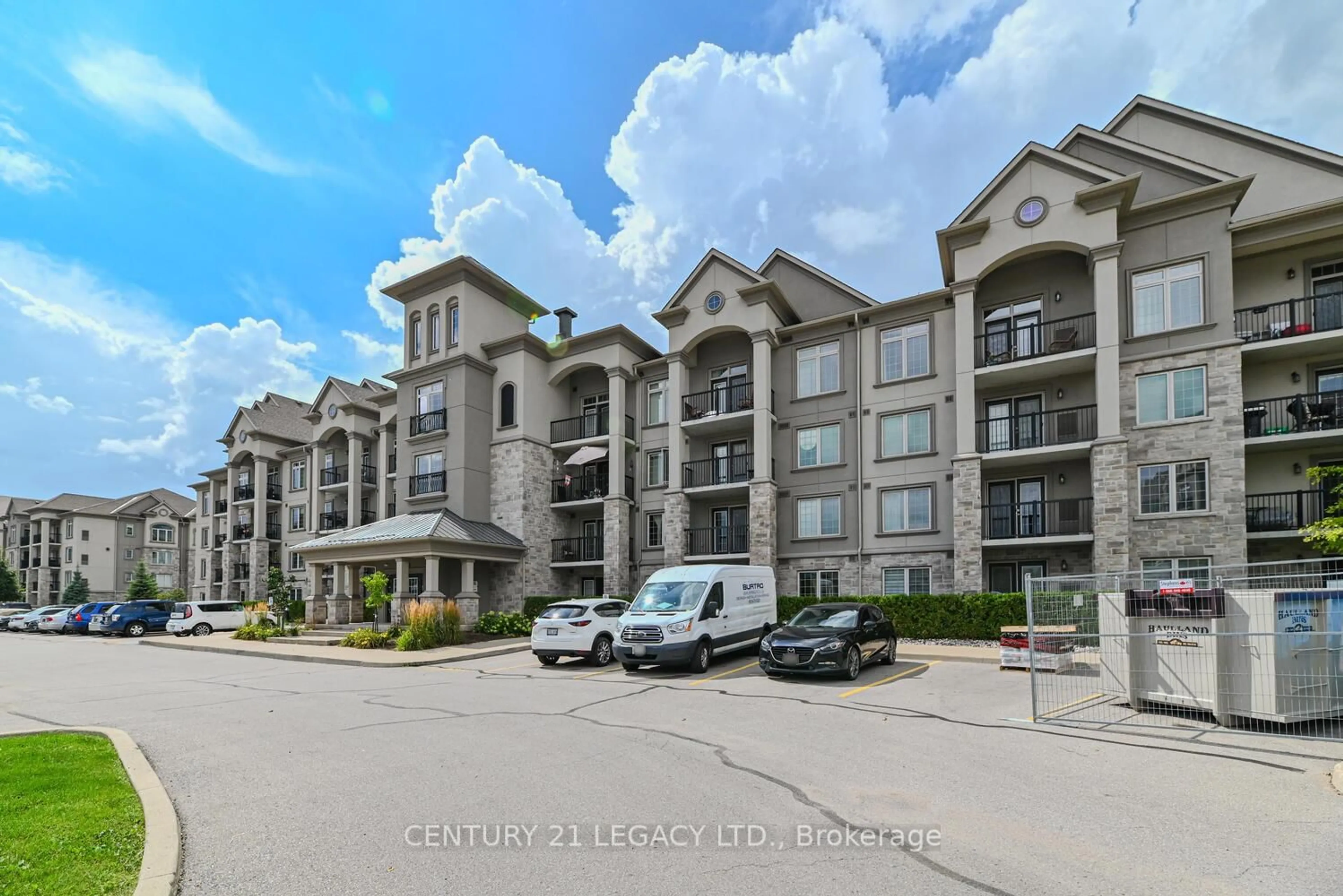 A pic from outside/outdoor area/front of a property/back of a property/a pic from drone, unknown for 1460 Main St #214, Milton Ontario L9T 8W5