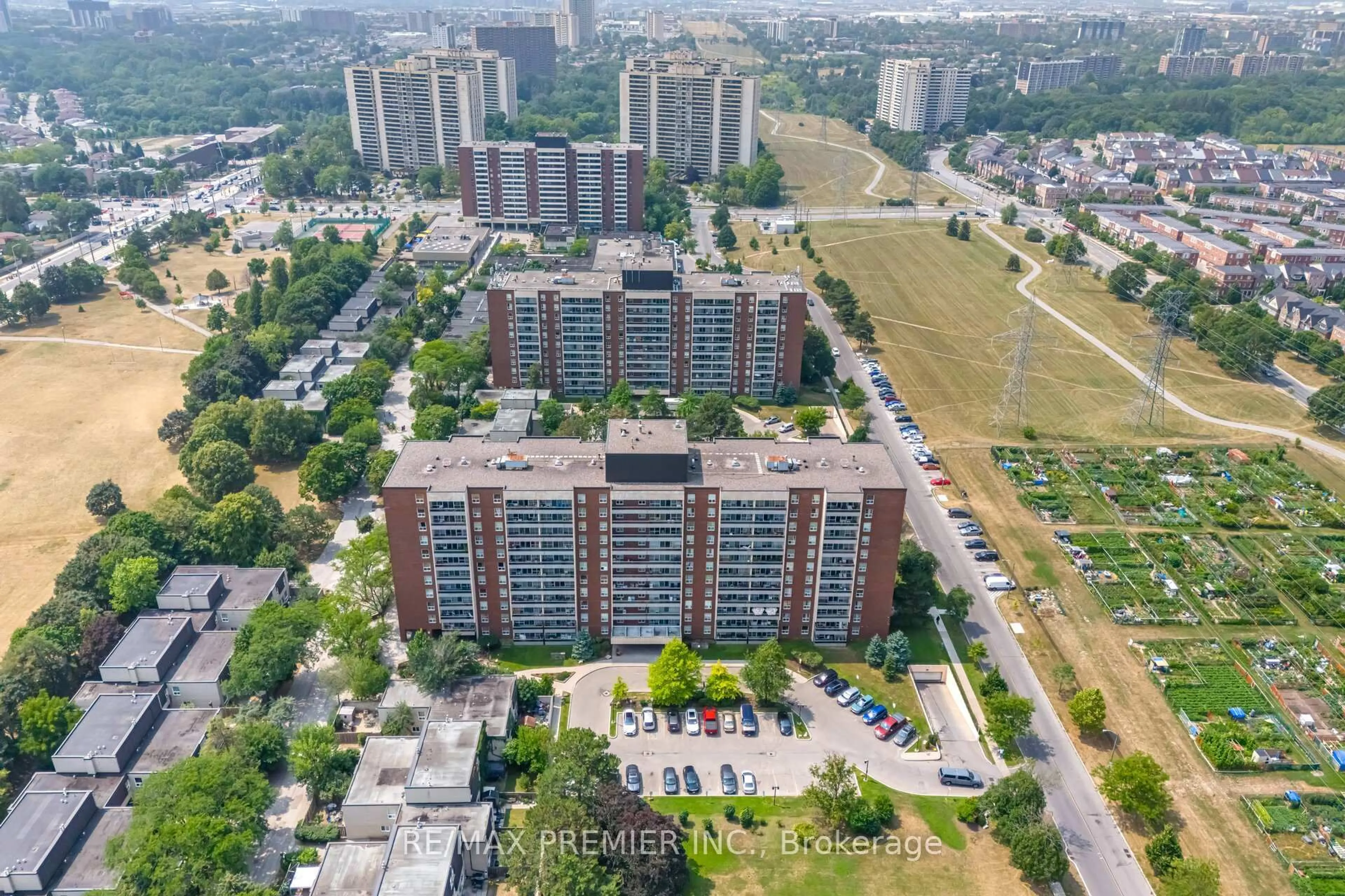 A pic from outside/outdoor area/front of a property/back of a property/a pic from drone, city buildings view from balcony for 25 Four Winds Dr #811, Toronto Ontario M3J 1K8