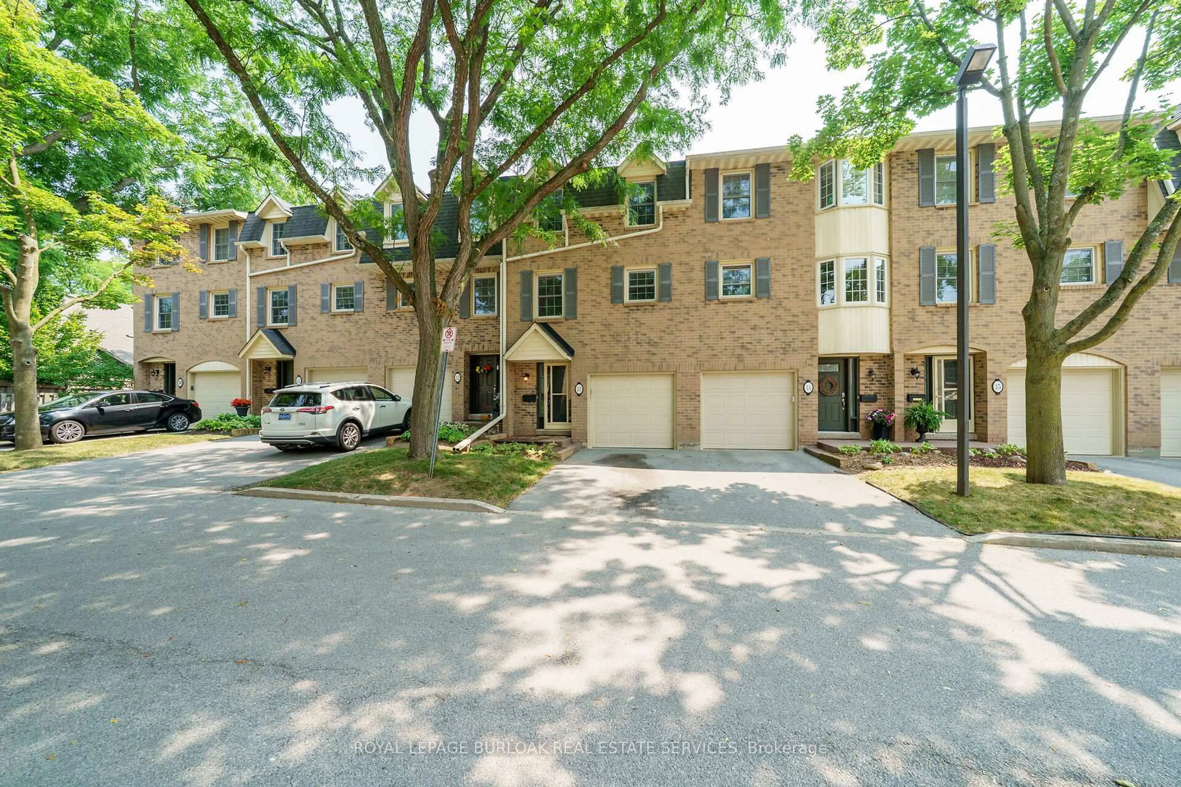 A pic from outside/outdoor area/front of a property/back of a property/a pic from drone, street for 1351 Ontario St #13, Burlington Ontario L7S 1E9