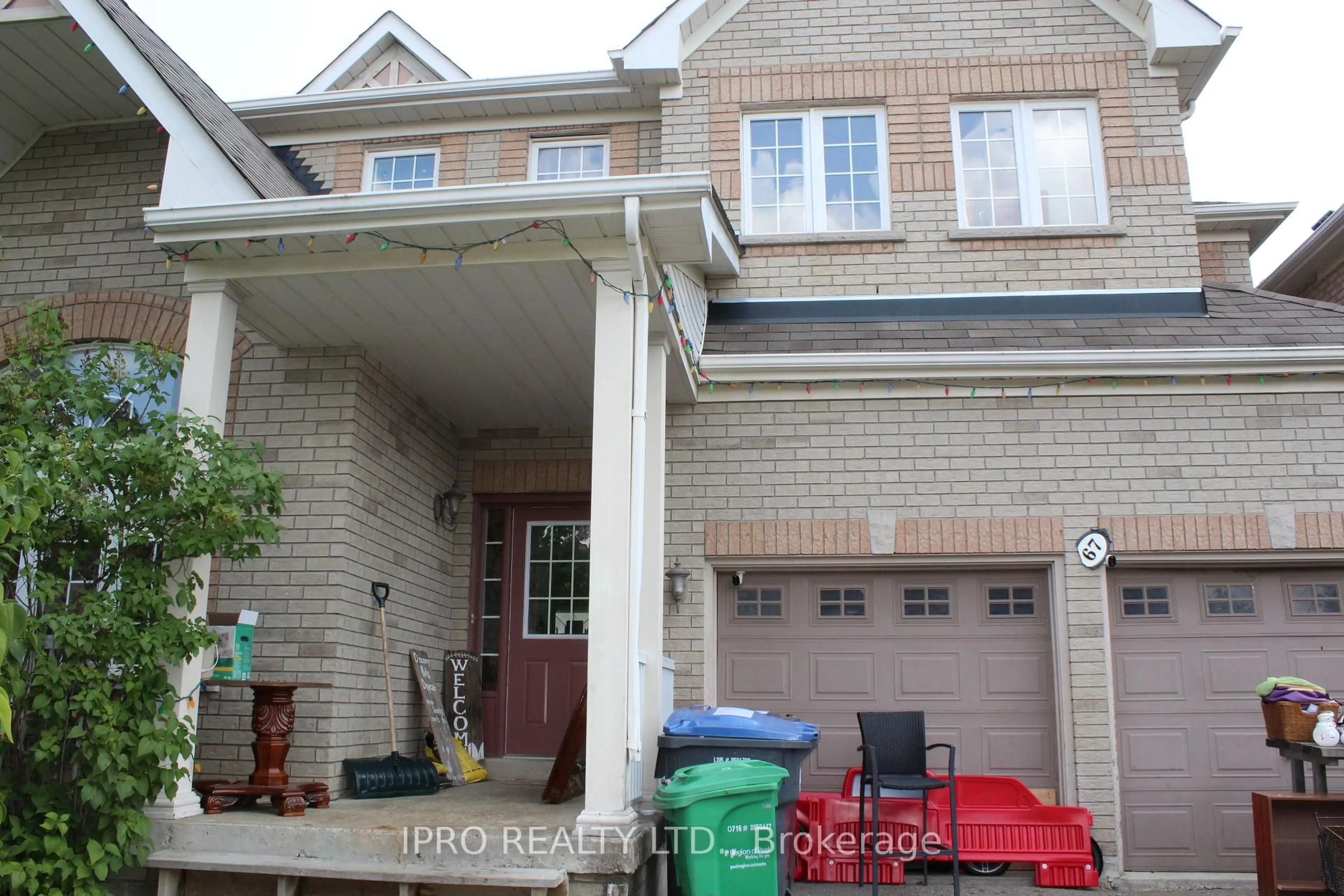 Home with brick exterior material, street for 67 Masters Green Cres, Brampton Ontario L7A 3K6