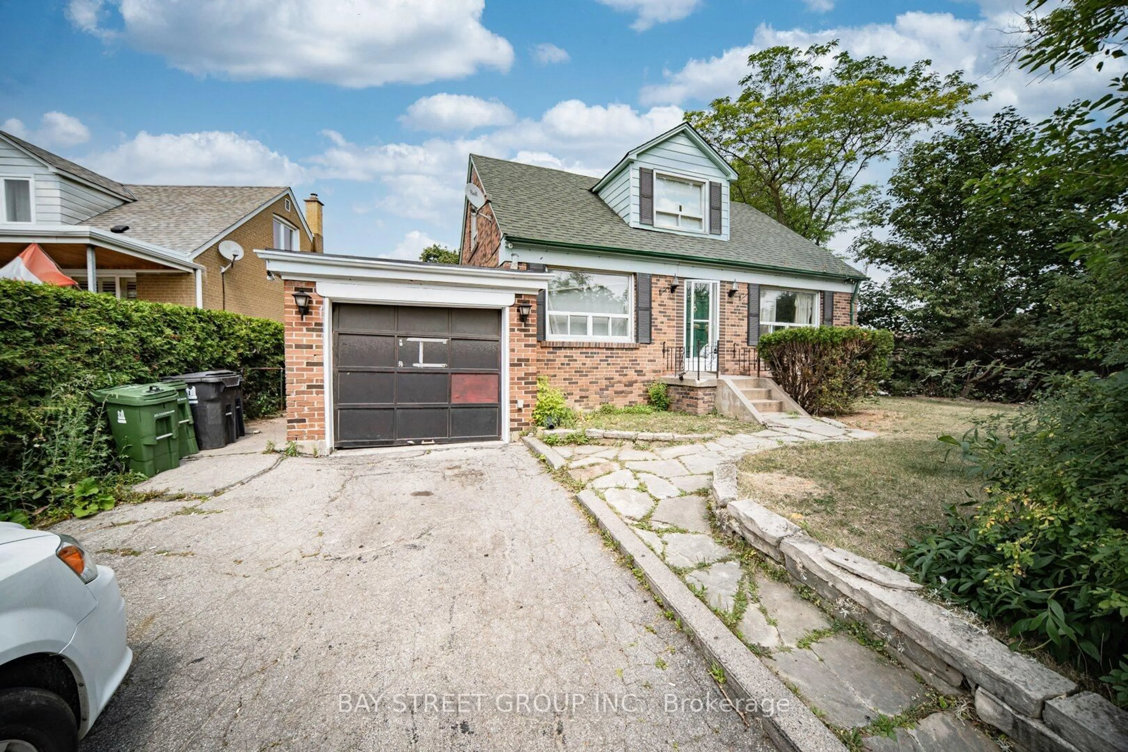 Home with brick exterior material, street for 1 Datchet Rd, Toronto Ontario M3M 1X4
