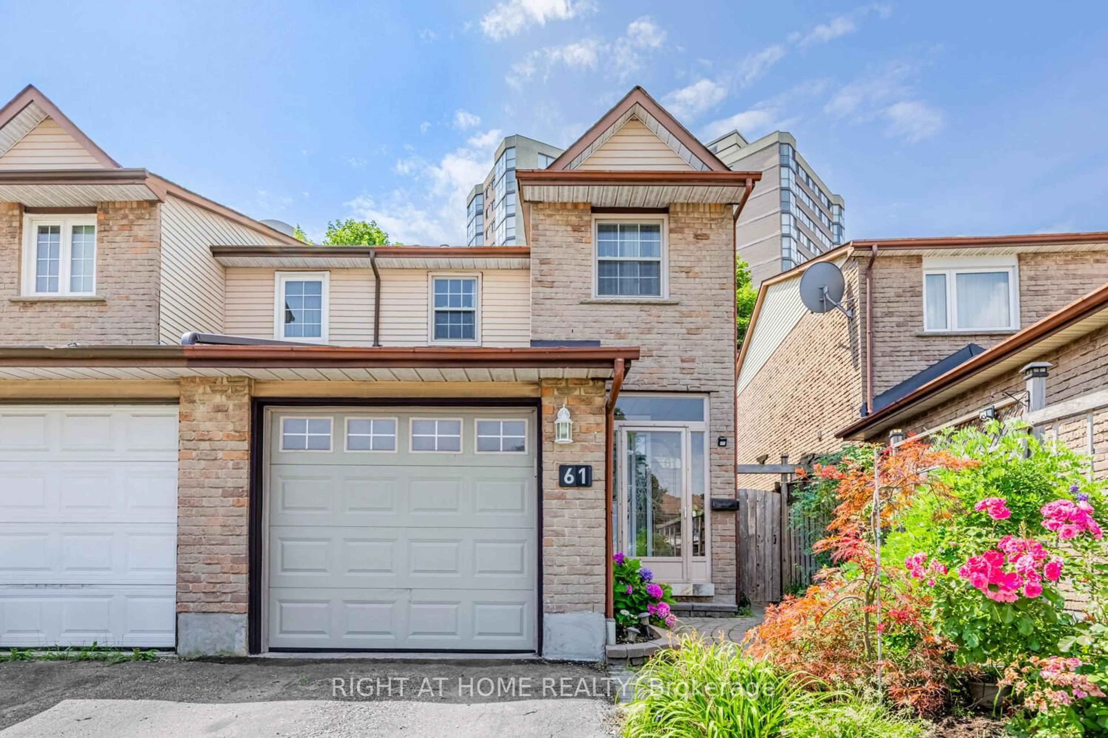 Home with brick exterior material, street for 61 Chalfield Lane, Mississauga Ontario L4Z 1K8