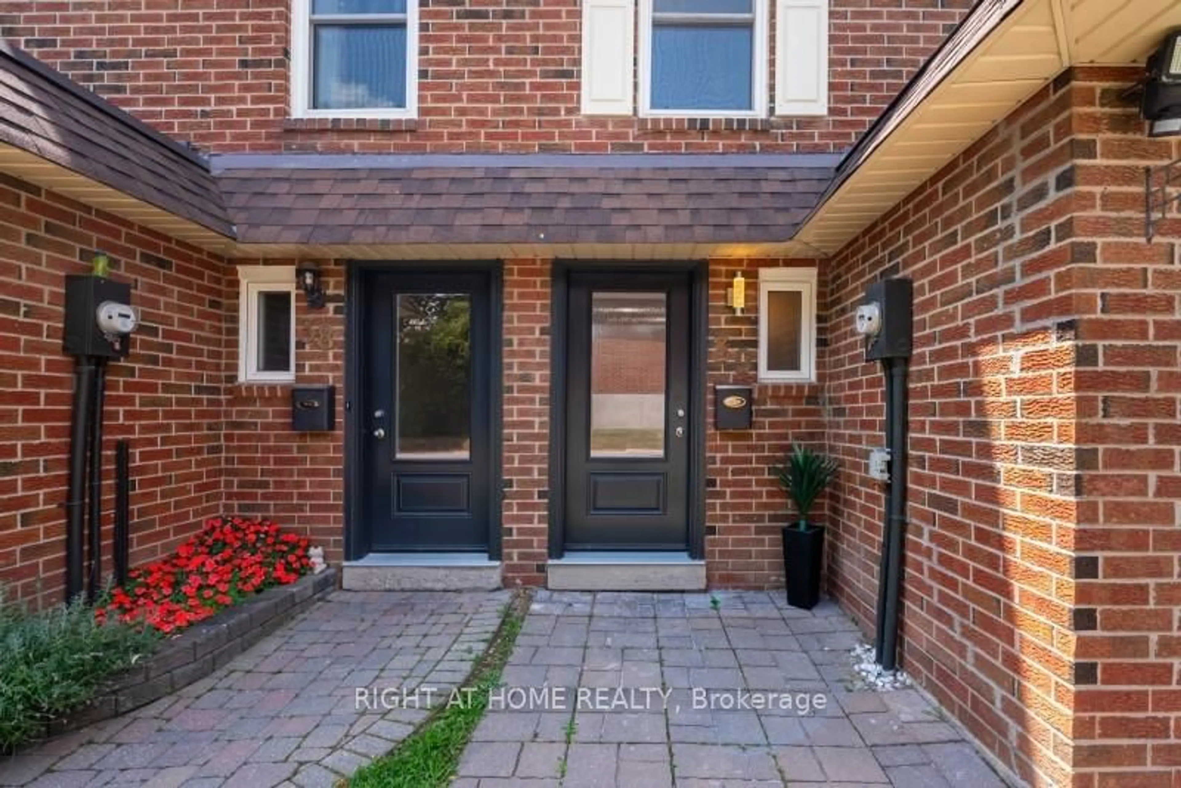 Home with brick exterior material, street for 30 Heslop Rd #39, Milton Ontario L9T 1B3