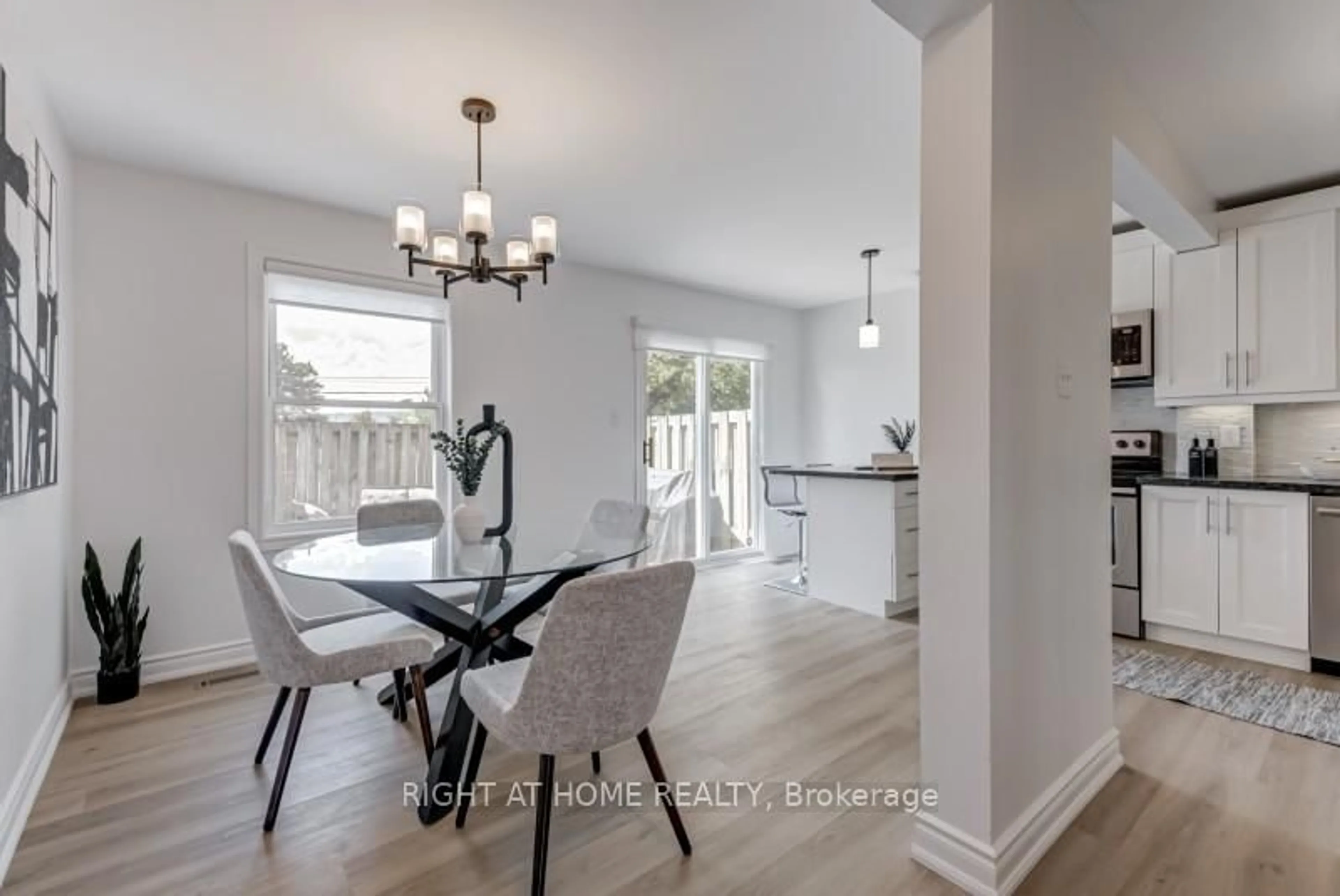 Dining room, wood/laminate floor for 30 Heslop Rd #39, Milton Ontario L9T 1B3